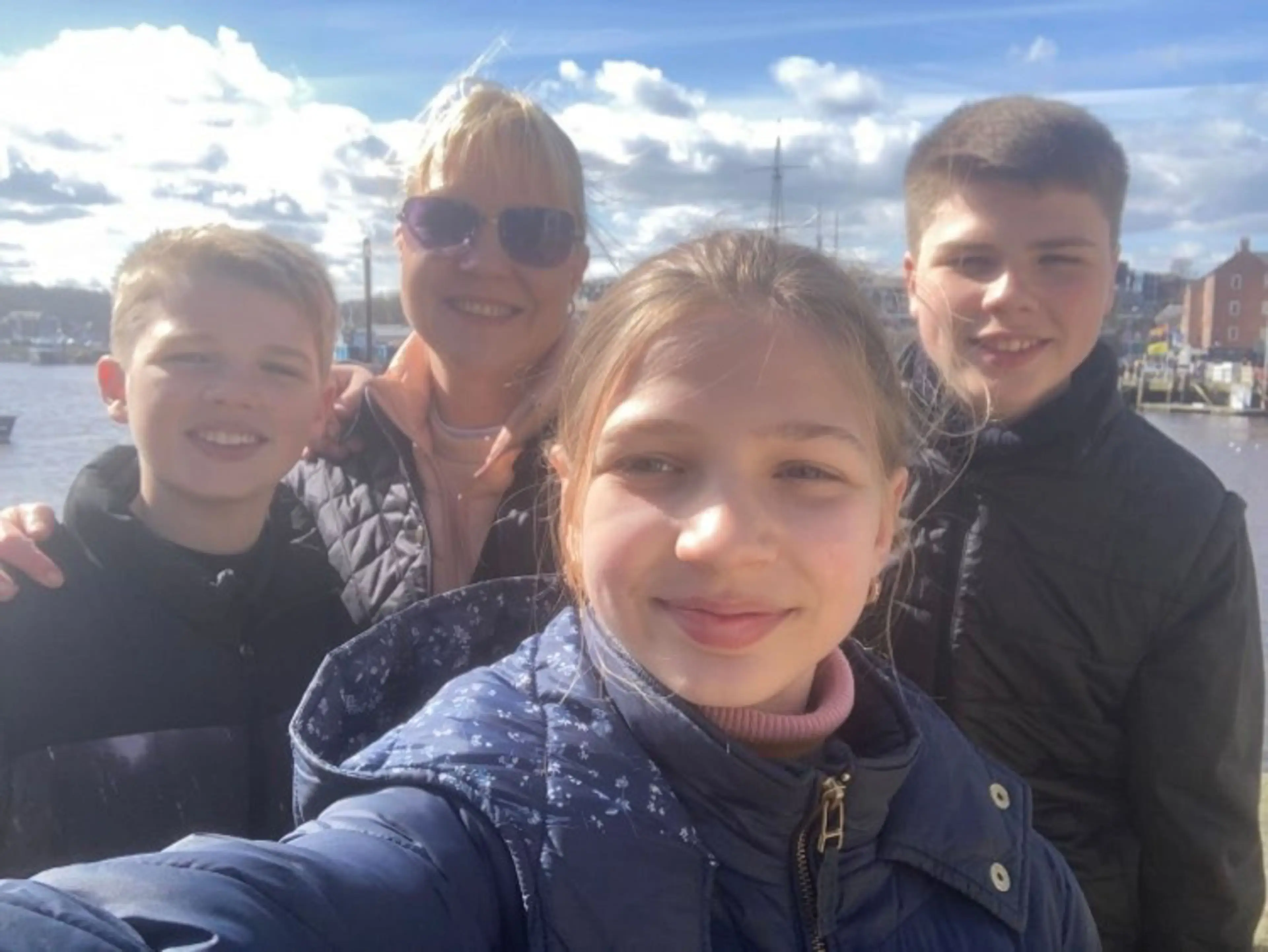 Louise with her three kids.