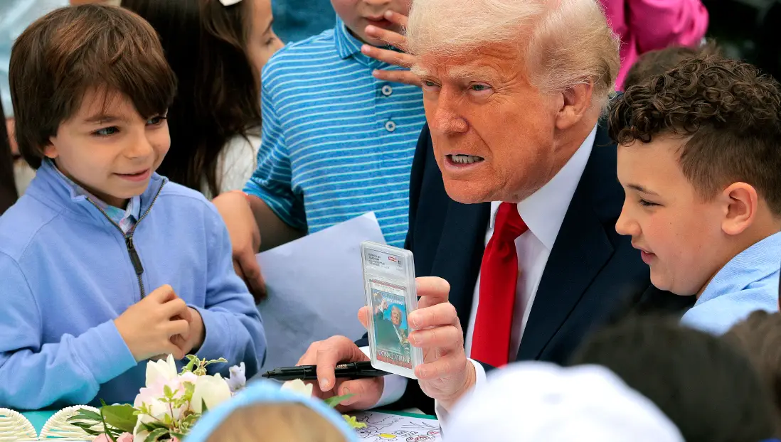 Donald Trump has sparked outrage over showing children the 'disturbing' image on the trading card (Chip Somodevilla/Getty Images)