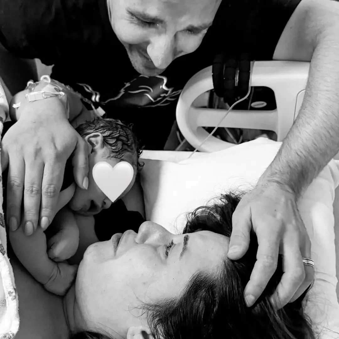 The happy couple shared the emotional pictures celebrating their daughter's birth (instagram/@alainamariescott)