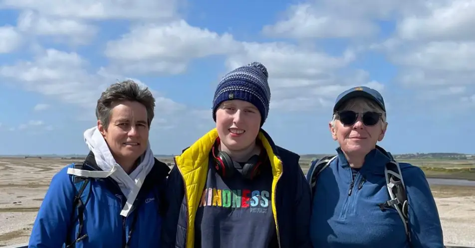 Tiegan was raised by adoptive mums Maggie, 54, and Anne, 57.