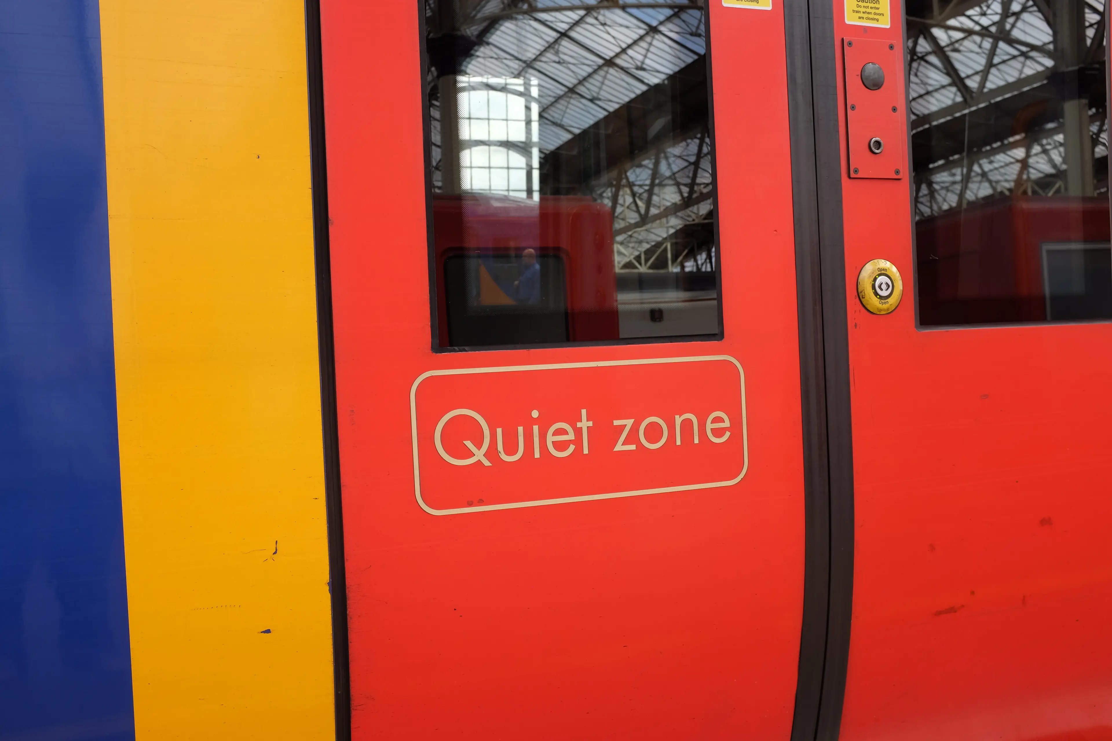 The woman was sitting in the quiet carriage.