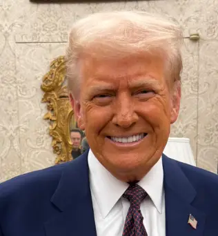 Eagle-eyed social media users clocked Elon Musk's reflection in the White House picture (X/@bscholl)