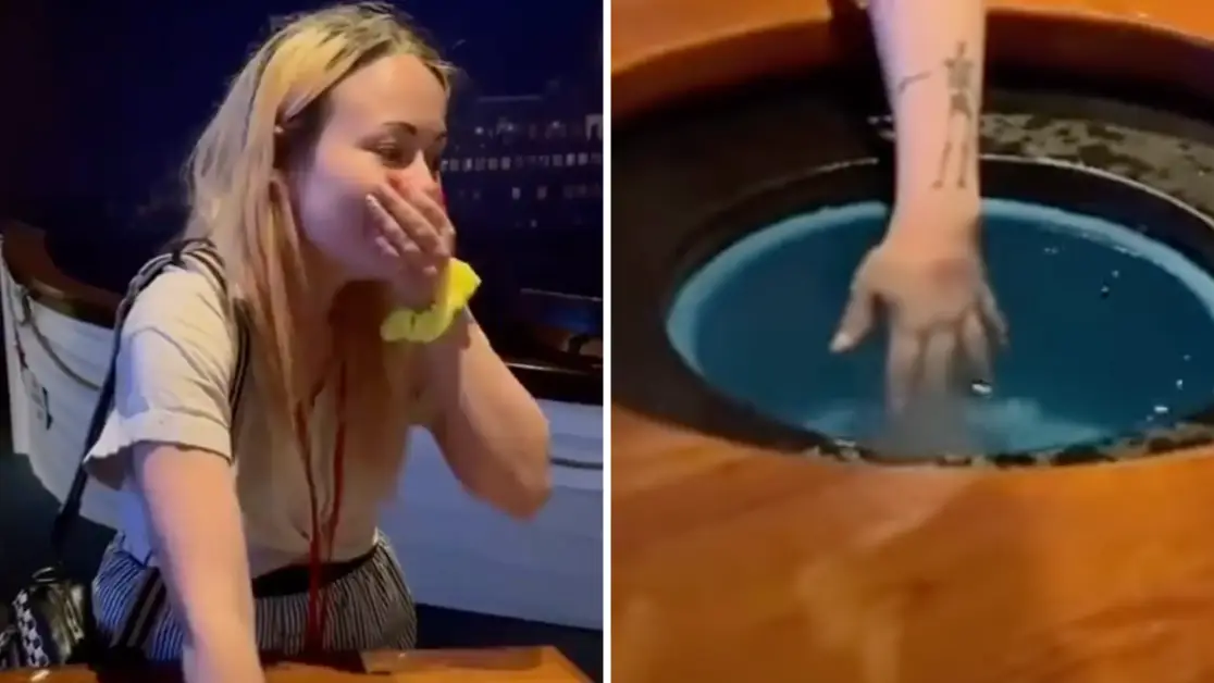Tourists put hand in water set to exact temperature of ocean when The Titanic sank to see if they can handle it