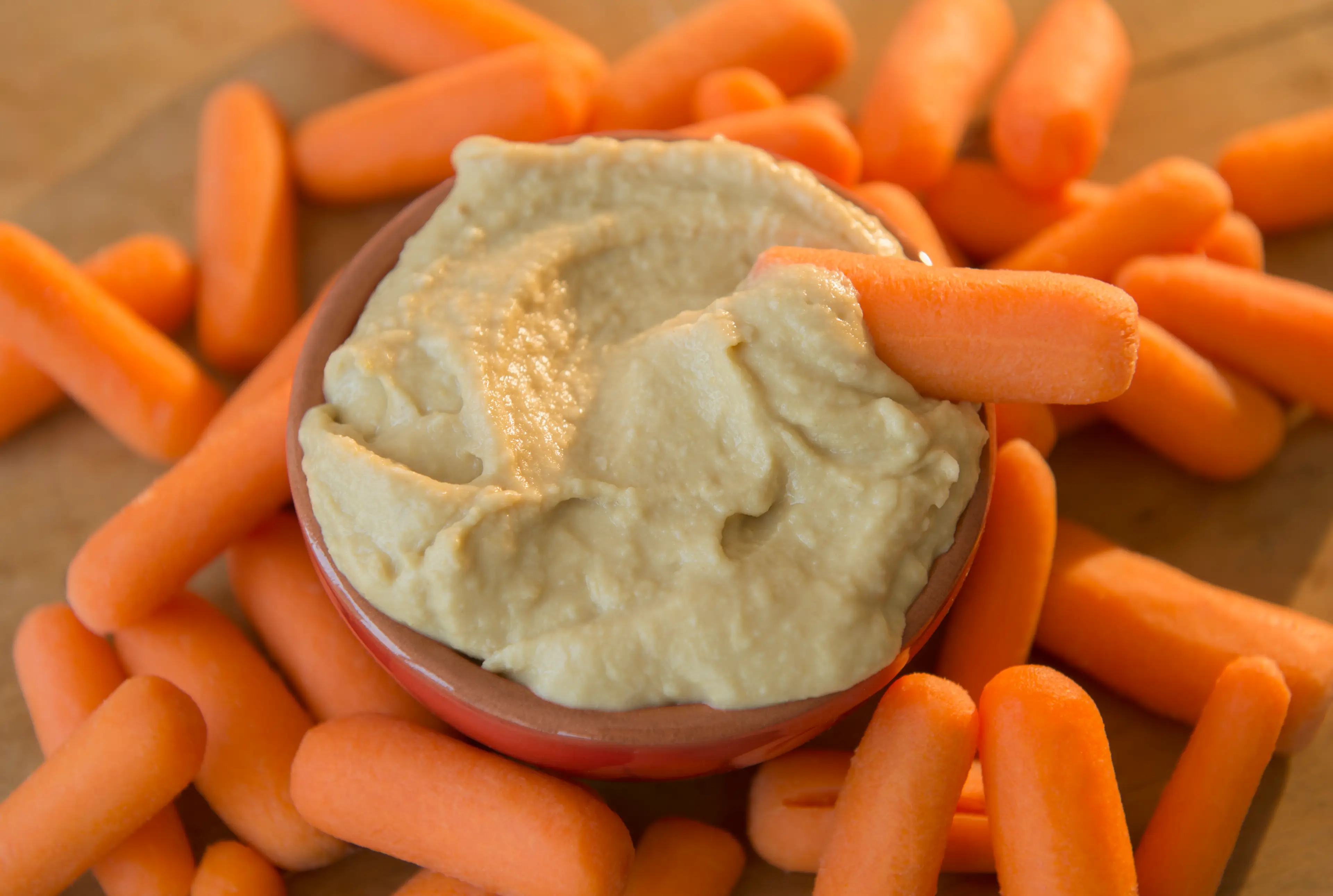 According to an expert, you're storing your hummus wrong (Johner Images/Getty Images)