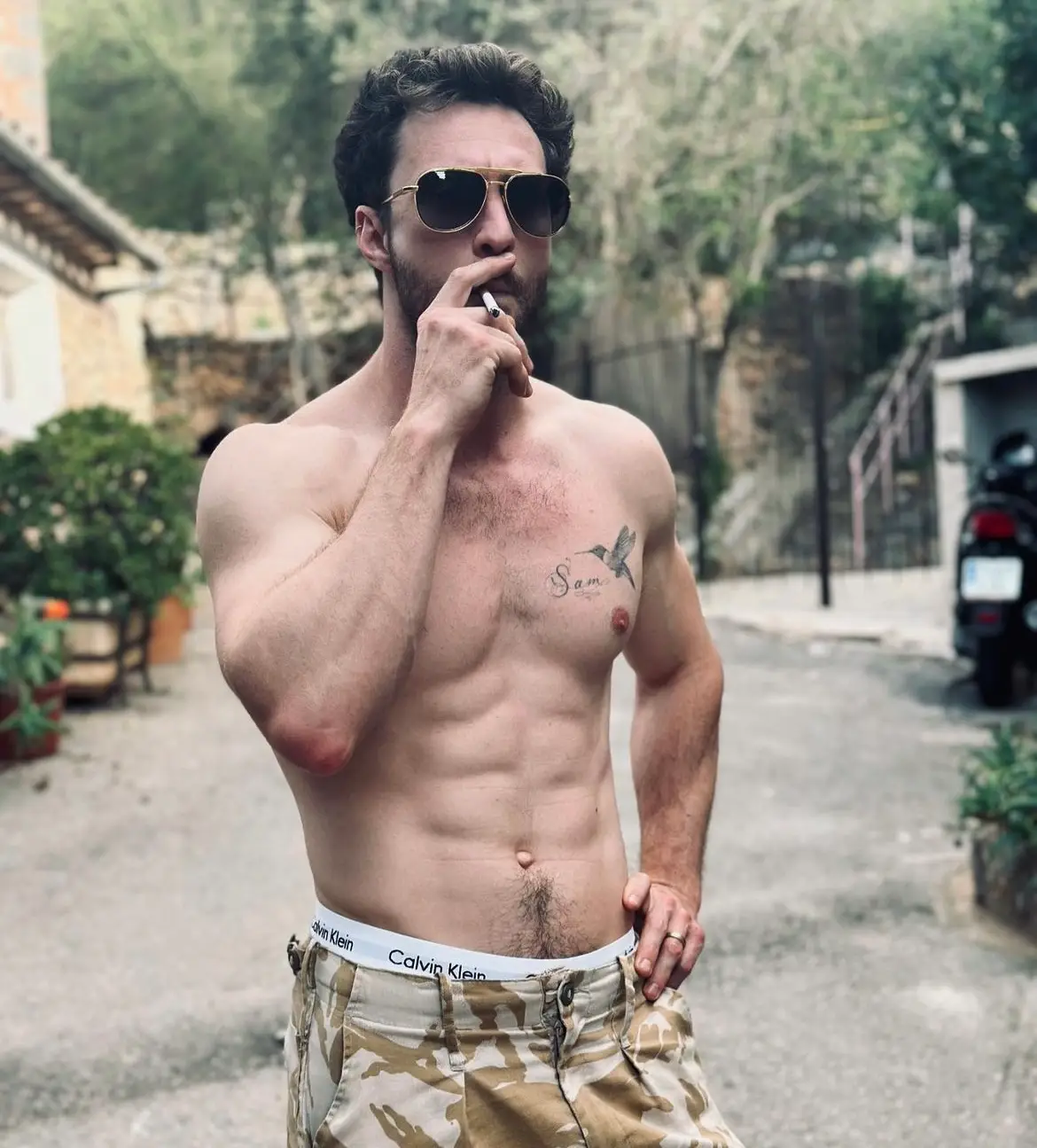 Fans have gone wild for the photos of shirtless Aaron on holiday.