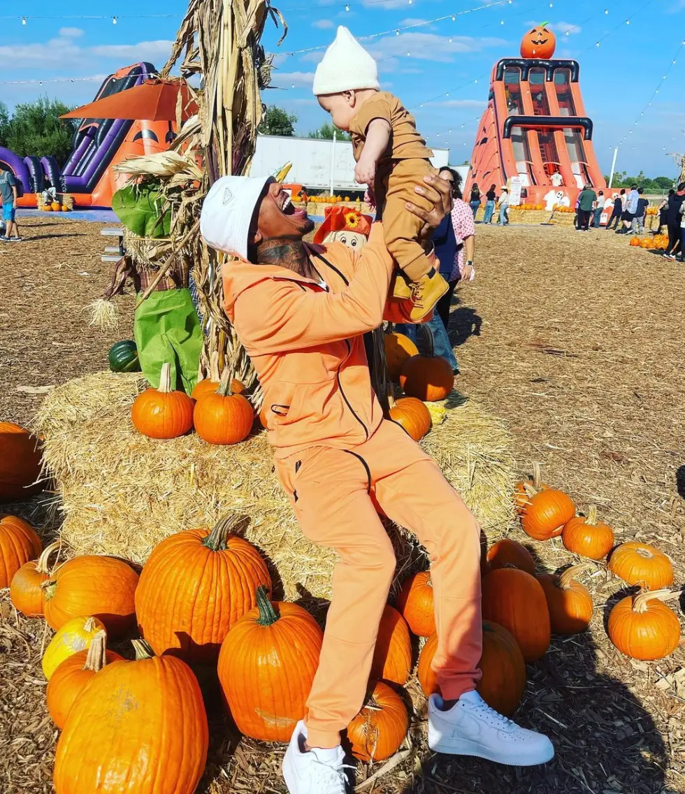 The proud dad with son Legendary Love.