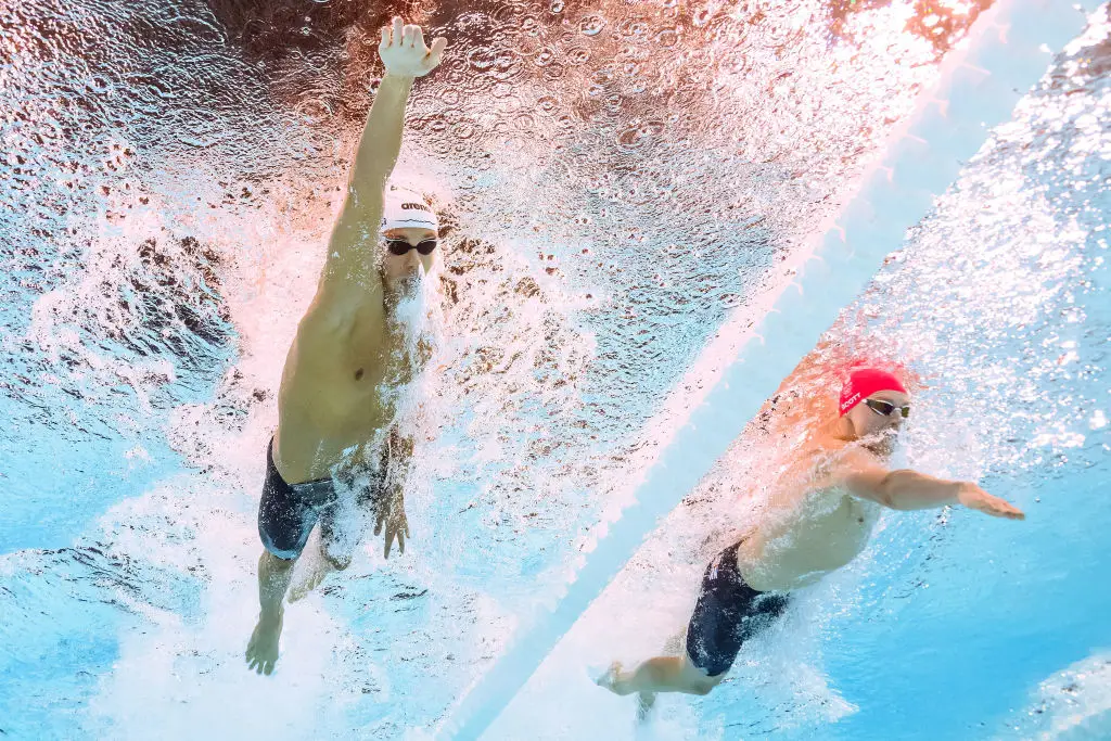 There are some pretty strict rules when it comes to Olympian's swimsuits. (MANAN VATSYAYANA/AFP via Getty Images)