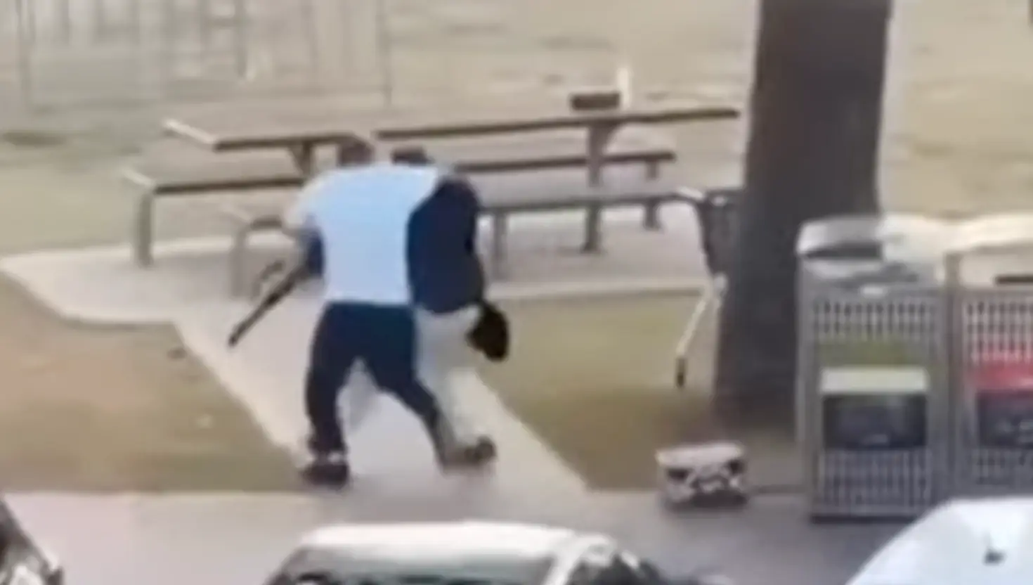 One of the alleged gunmen is shown in a viral video (7News)