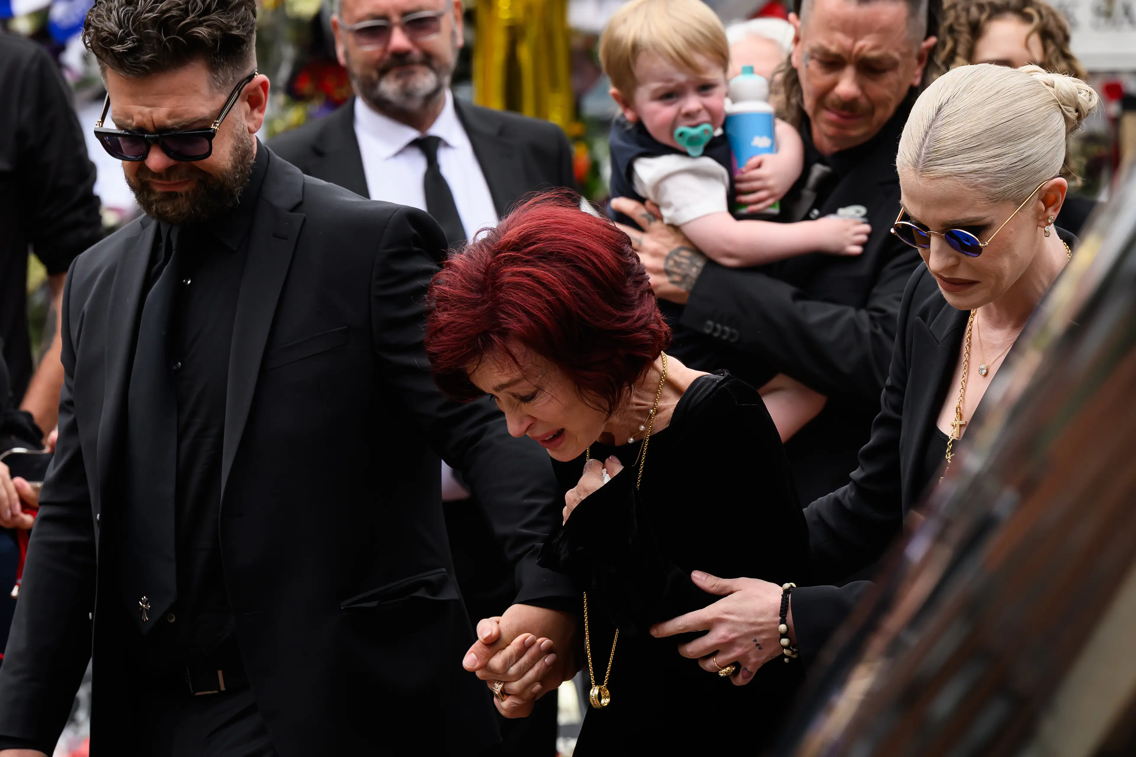Sharon Osbourne and her children were seen at Ozzy's public funeral procession (Leon Neal/Getty Images)