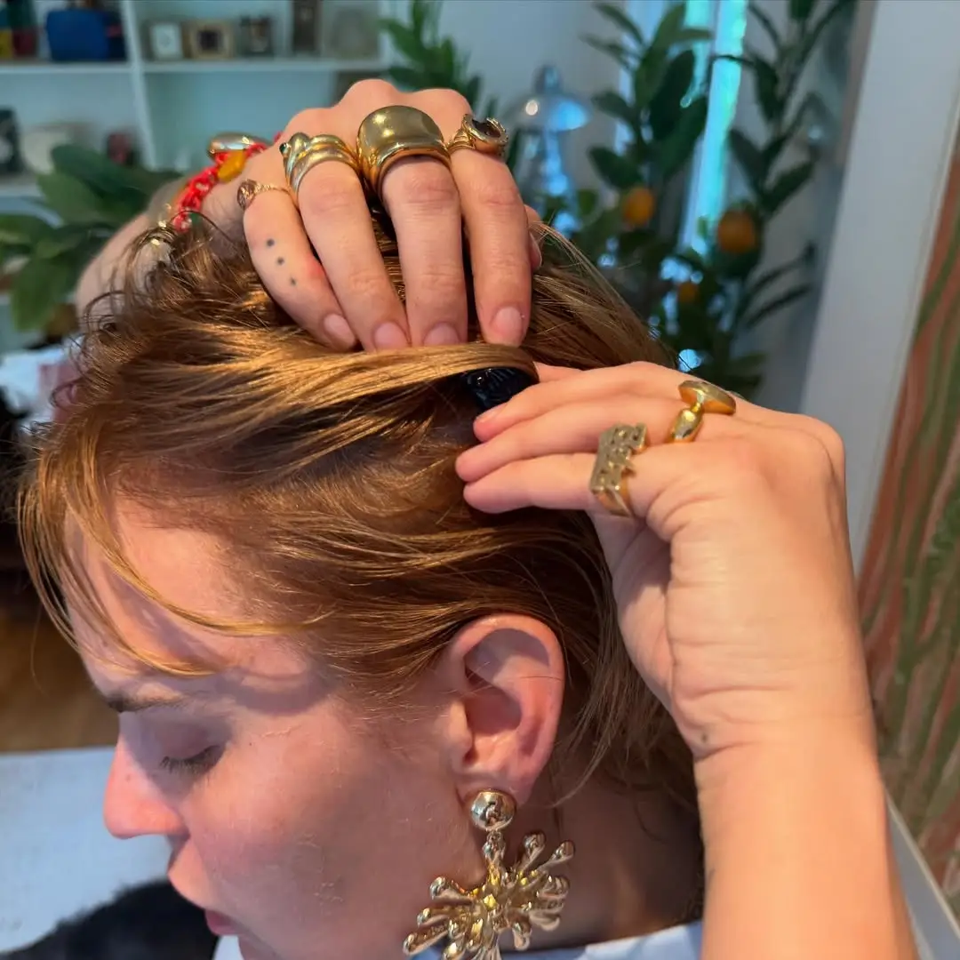 She also shared four images of her hair post-recovery which is notably thicker and healthier (Instagram/@buuski)