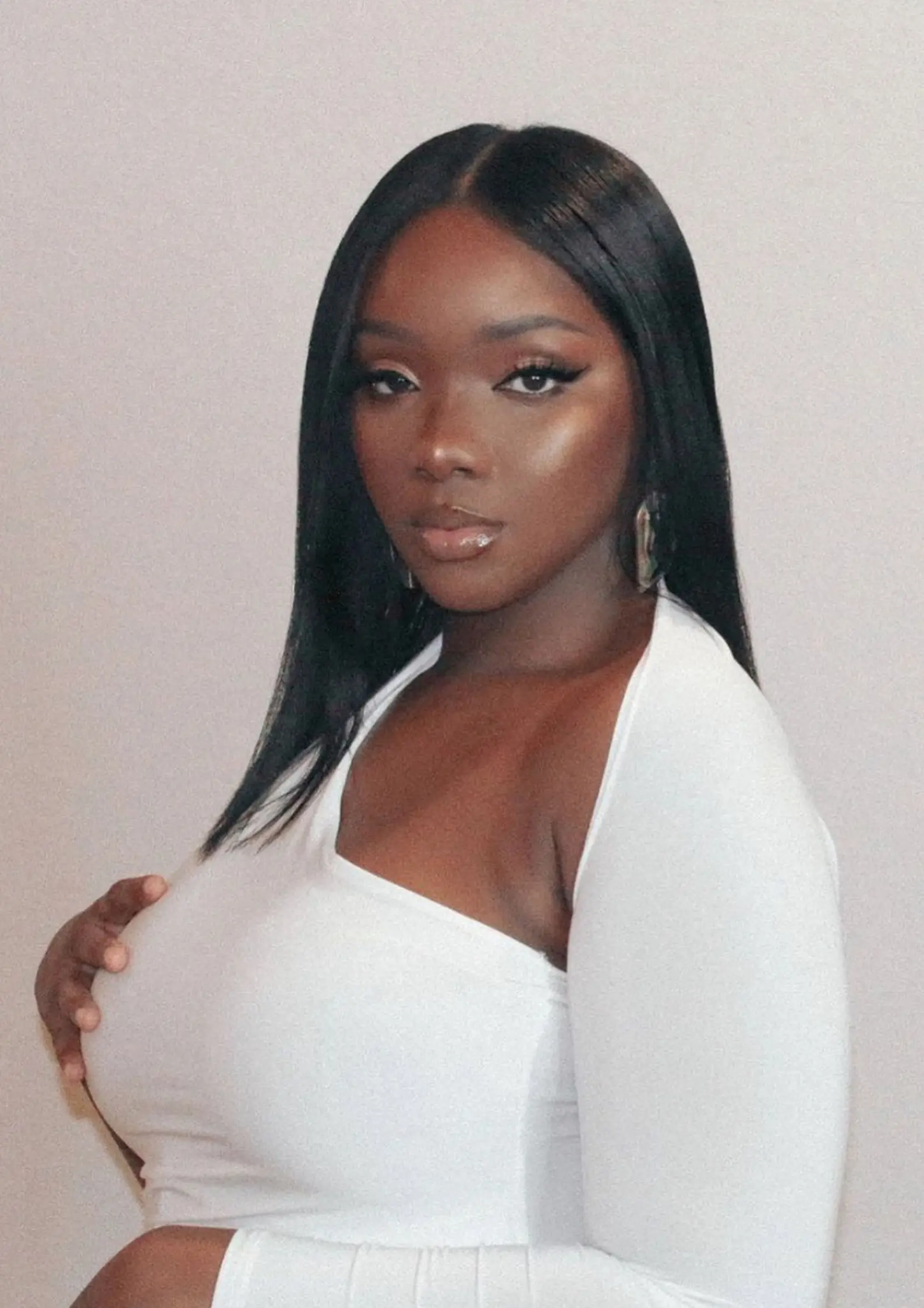 Shanika McNeil claims it was a bad reaction to her hair dye that caused her head to swell like a balloon.