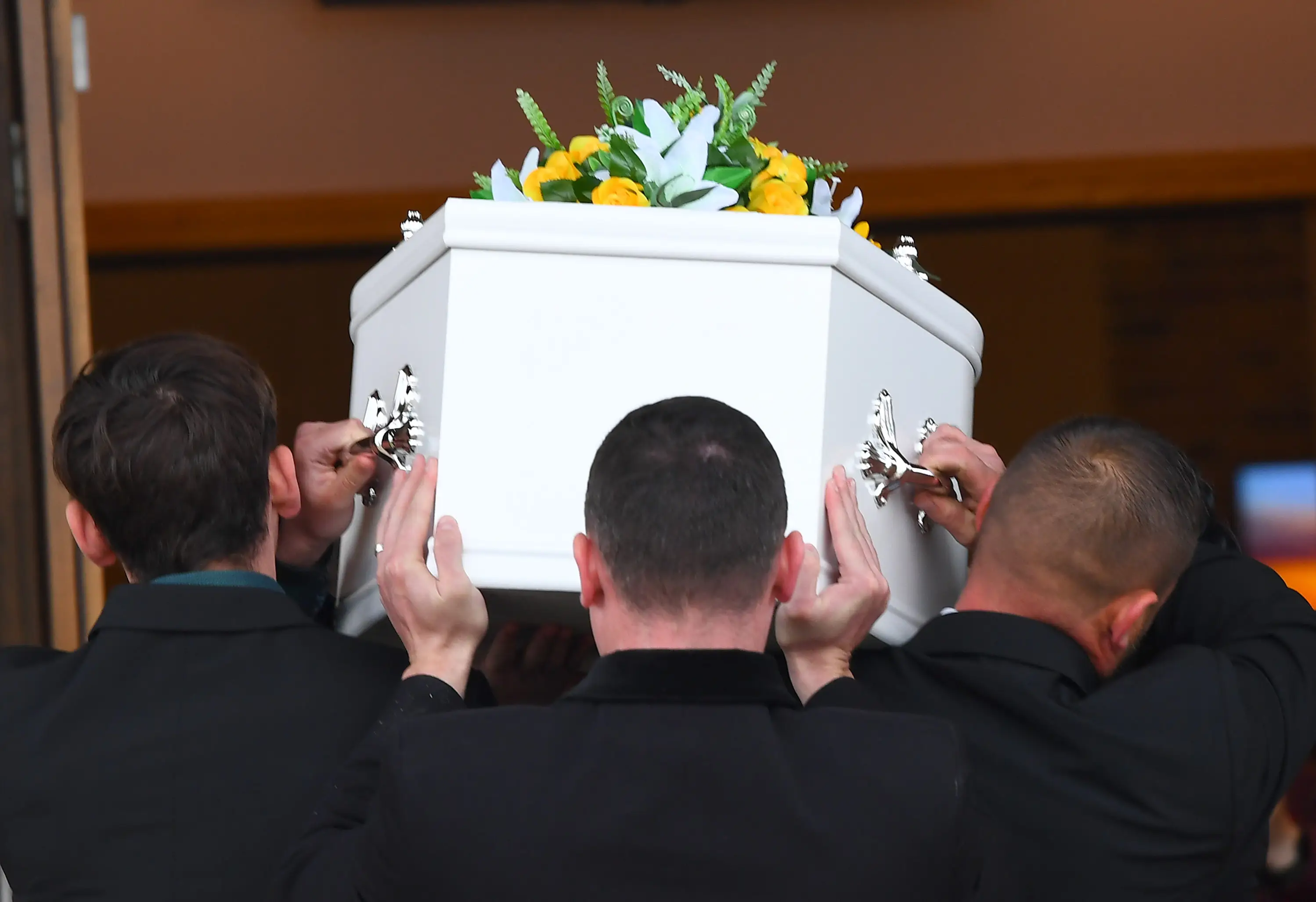 Katie's father died just hours after her funeral.