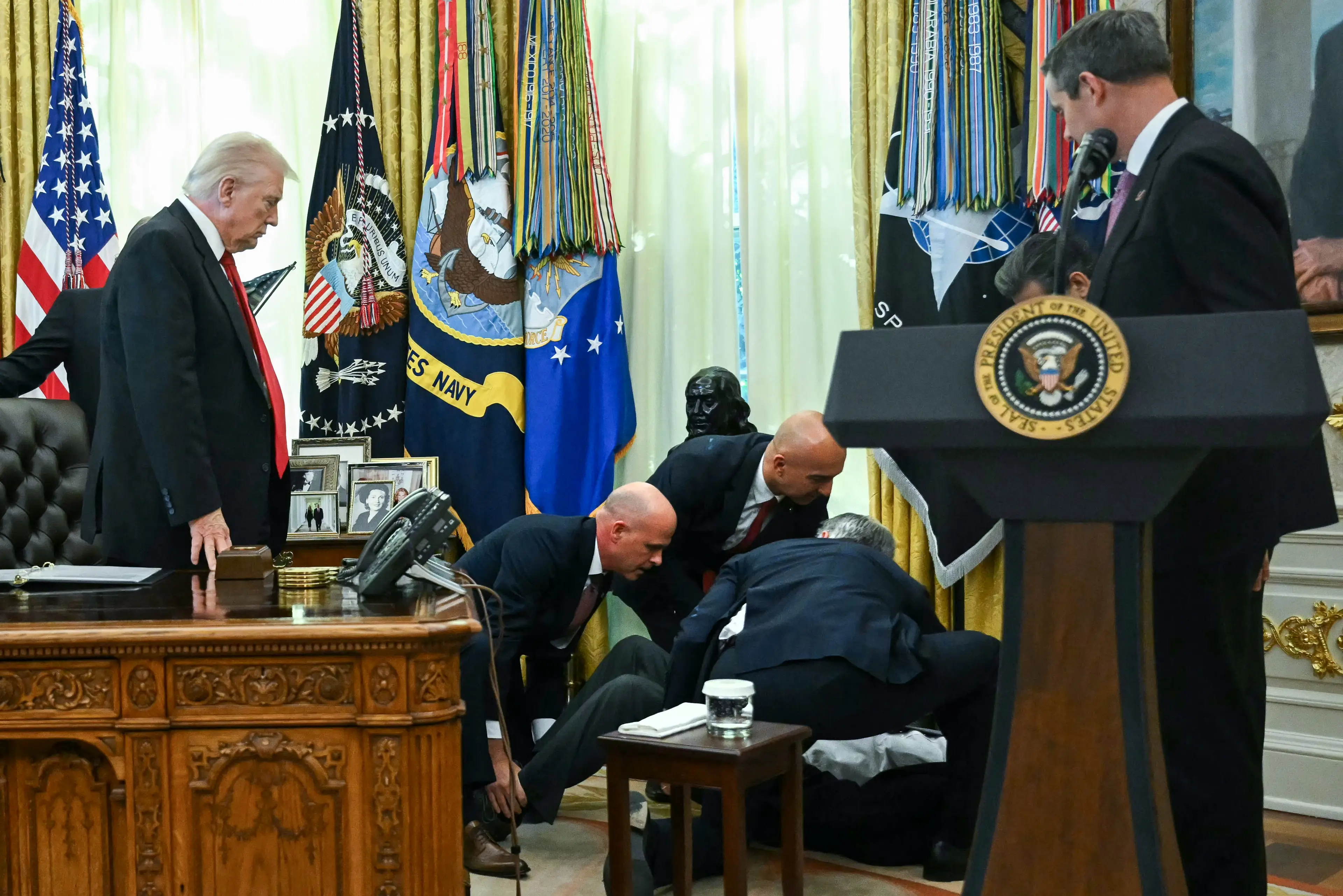 A man collapsed during an Oval Office press conference yesterday (ANDREW CABALLERO-REYNOLDS/AFP via Getty Images)