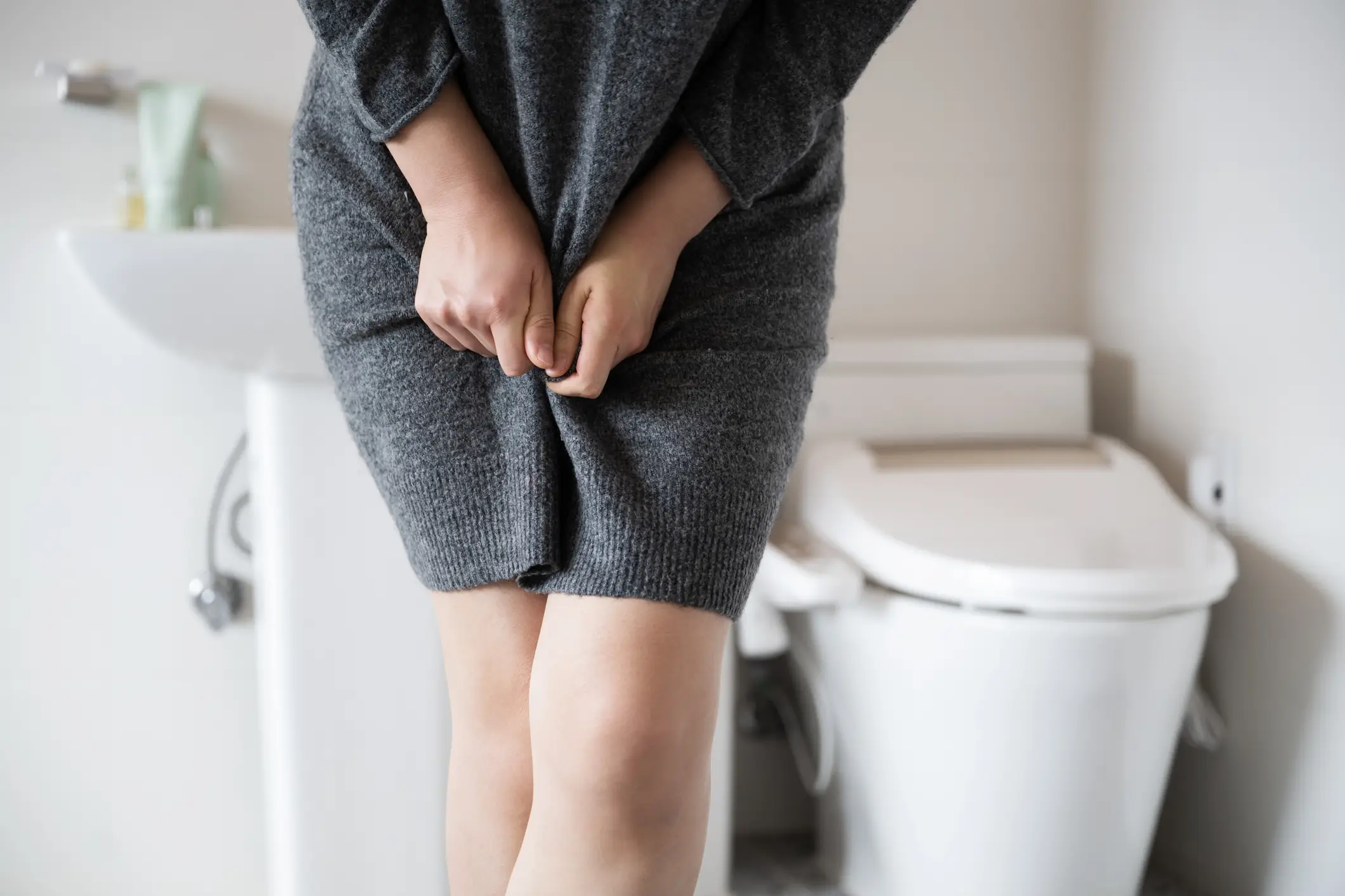 Experts have warned over a specific type of urinary incontinence if you find you're 'peeing yourself' when you go to the loo (Getty Stock Images)