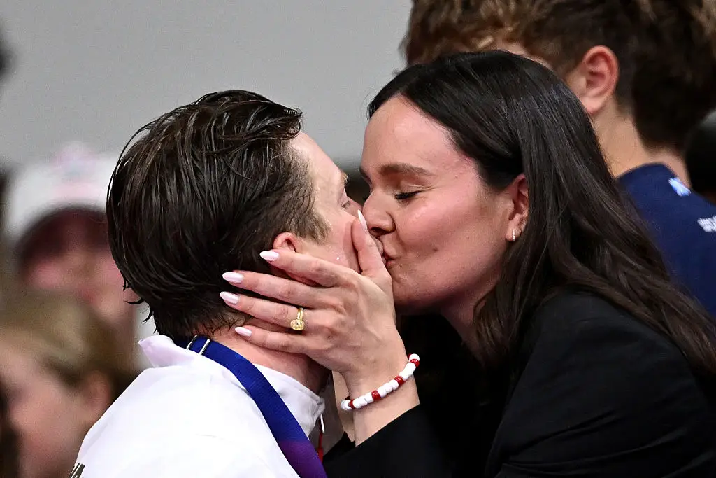 Holly and Adam got married in December, with the athlete's parents missing from the ceremony (Quinn Rooney/Getty Images)