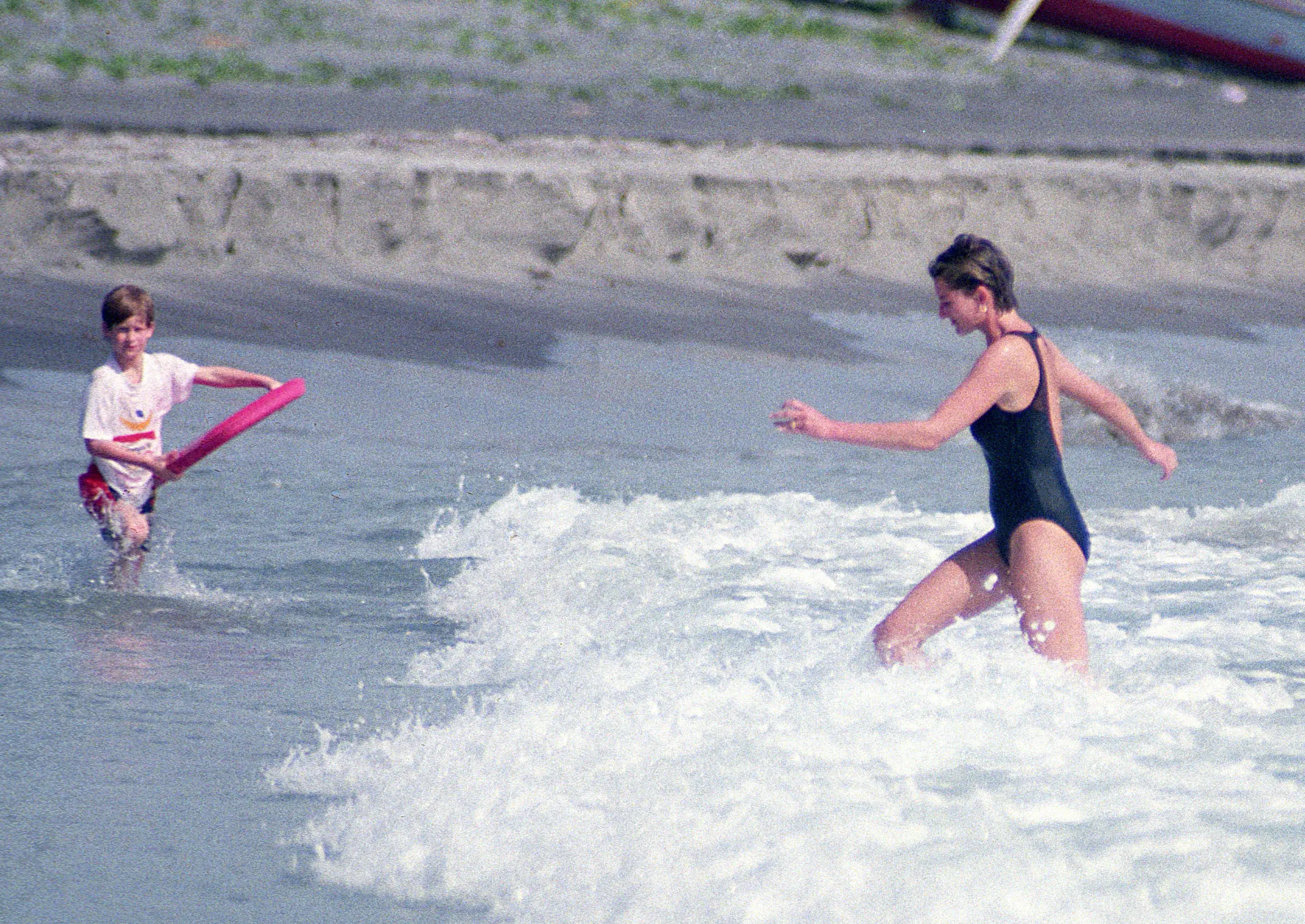 Princess Diana, pictured with Prince Harry in Nevis-St.Kitts 1993, often wore backless one-pieces (Tom Wargacki/WireImage)