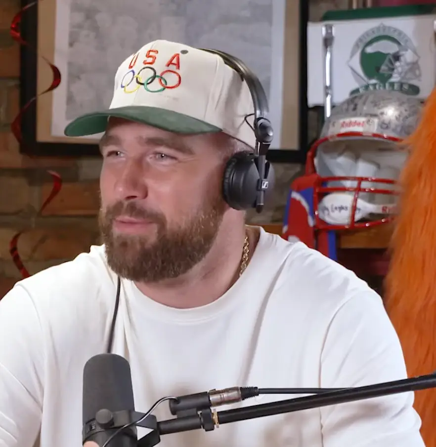 It's Alice IN Wonderland, Travis... (YouTube/New Heights)