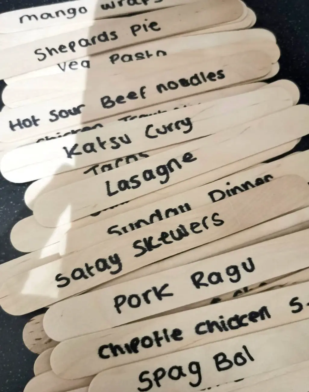 The couple choose seven lolly sticks at random each week.