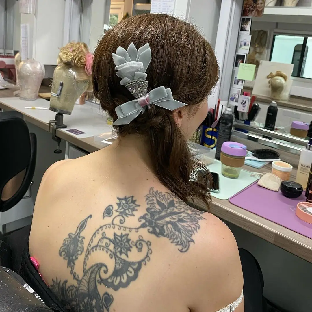 Claudia Jessie's beautiful back tattoo. (Instagram/@s.burton_mua)