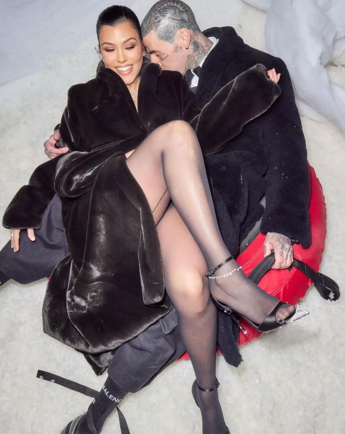 The pair seemingly enjoy heavy PDA (Instagram/@kourtneykardashian)