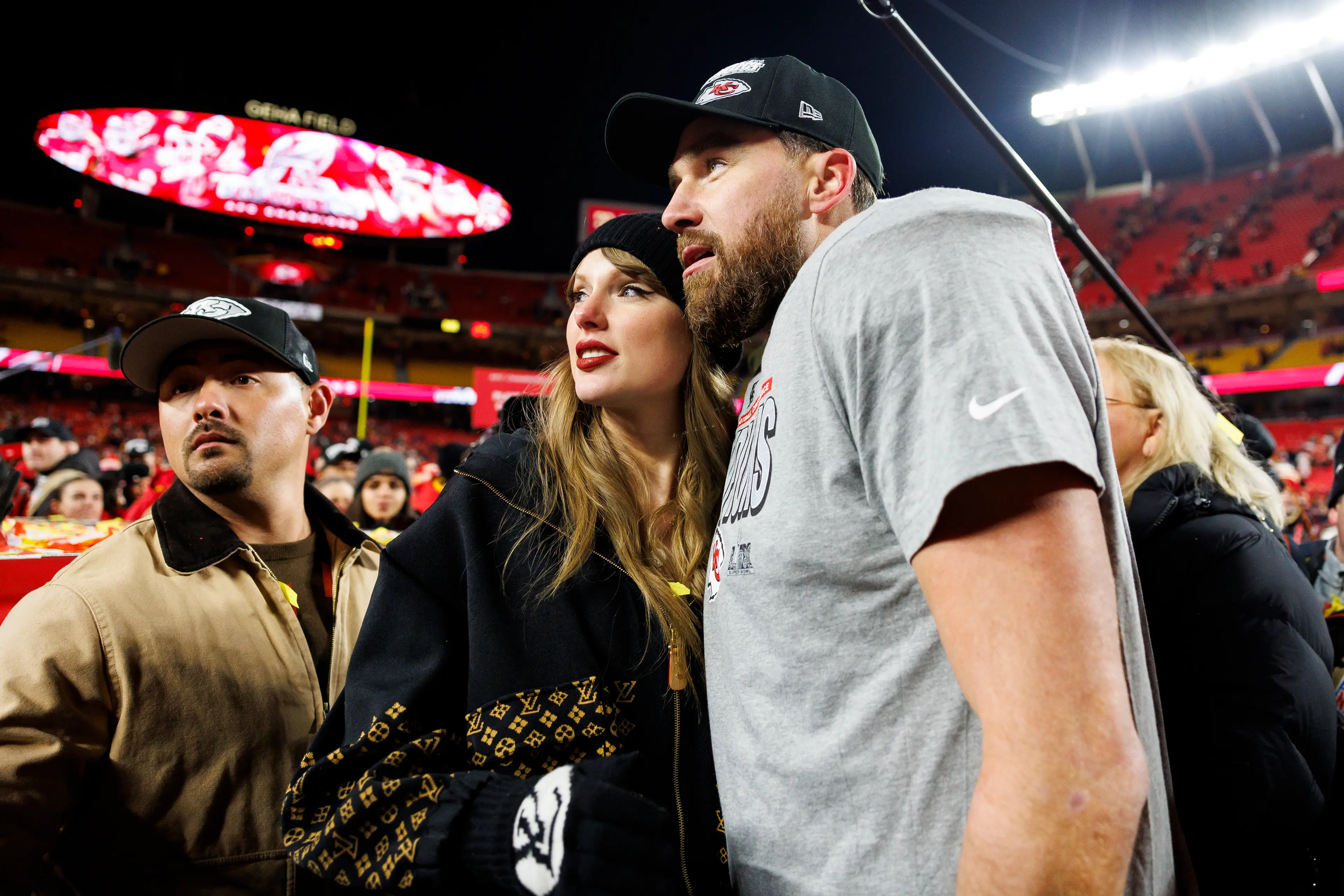 The couple were led off the field (Brooke Sutton/Getty Images)