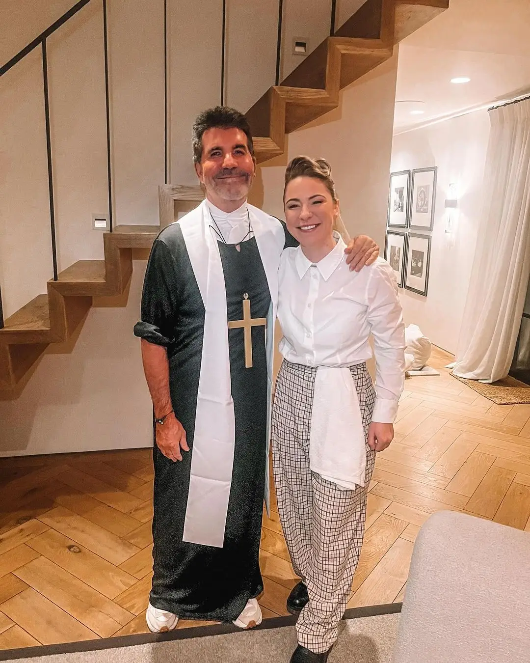 Spraggan introducing Cowell to a murder mystery game earlier this year (Instagram/@lspraggan)