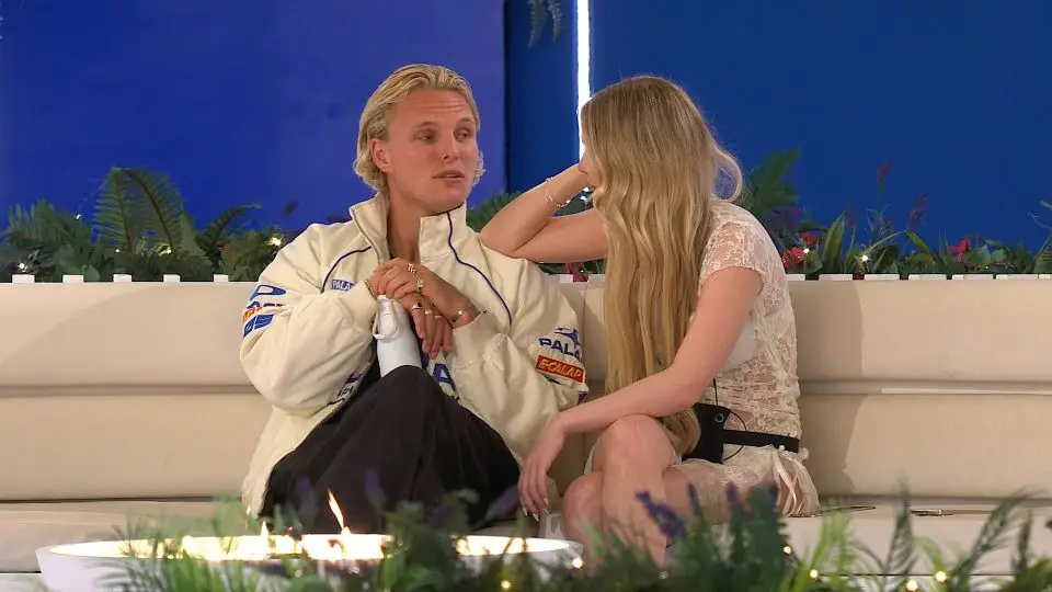 George caused a stir after kissing Robyn (pictured) despite being coupled with Mica (ITV)
