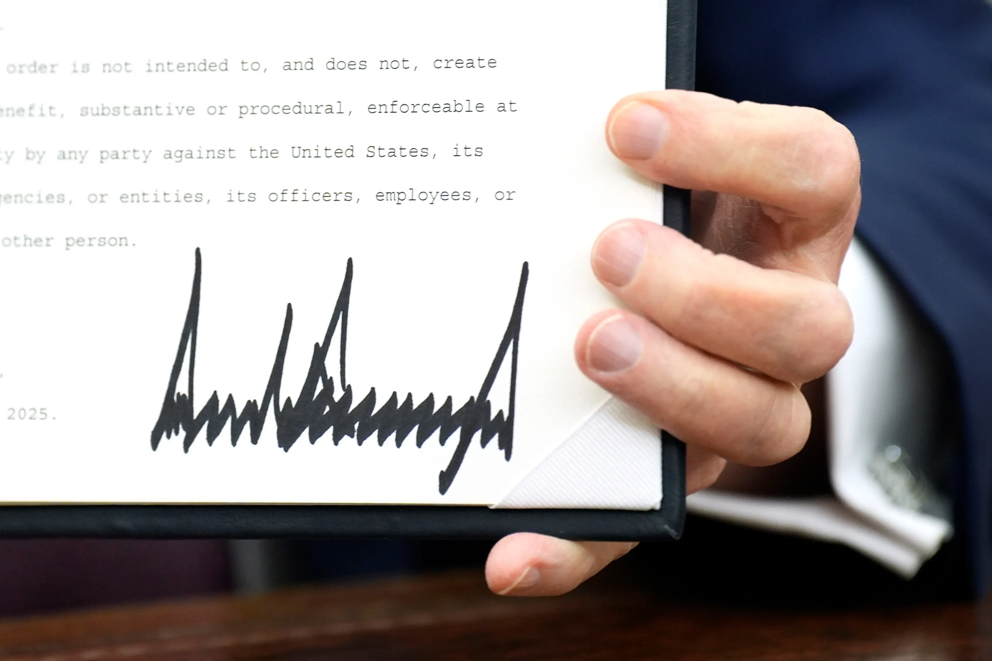 The notes bearing Trump's signature will be rolled out in June (Yuri Gripas/Abaca/Bloomberg via Getty Images)