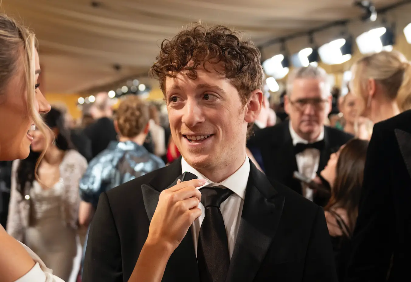 An interview with Ethan Slater has been branded a 'hard watch' after he awkwardly answered a question about girlfriend Ariana Grande (Eric McCandless/Disney via Getty Images)