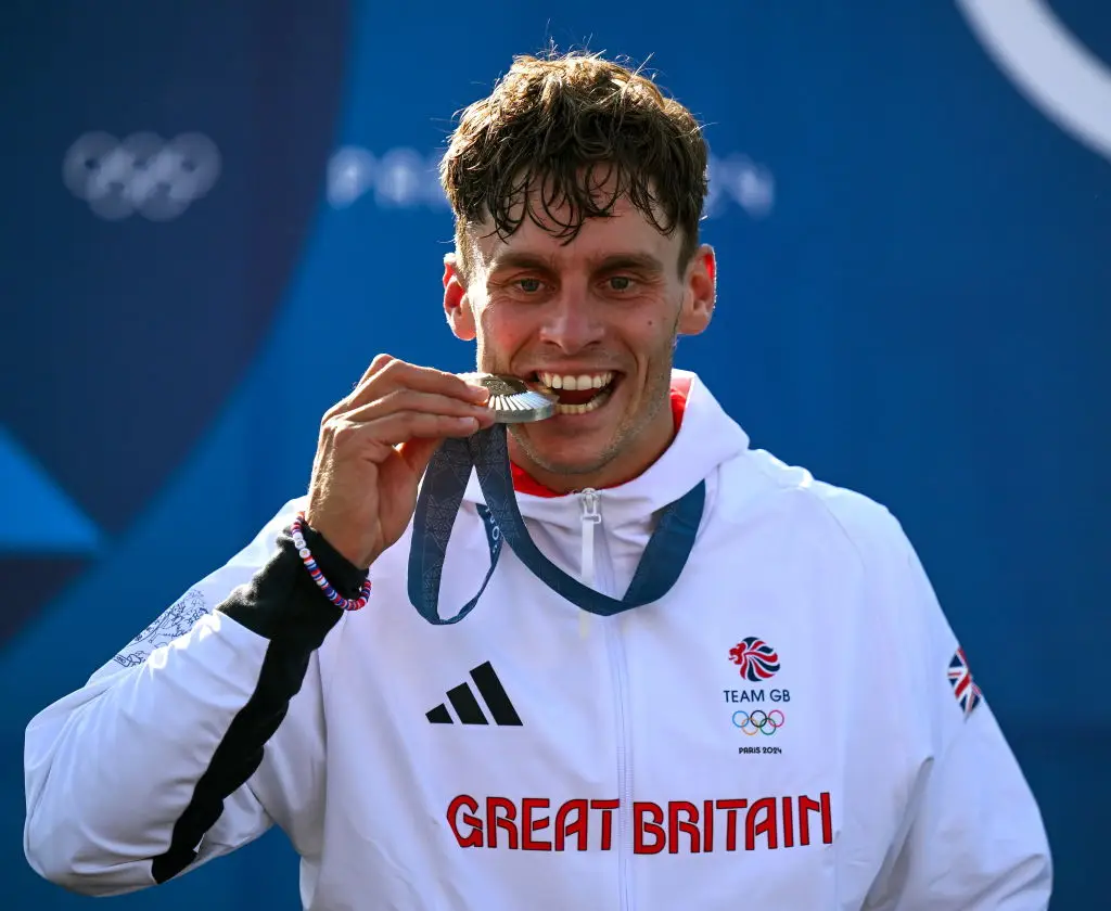 Team GB's Adam Burgess with his silver medal for the men's Canoe Slalom final.(Brendan Moran/Sportsfile via Getty Images)