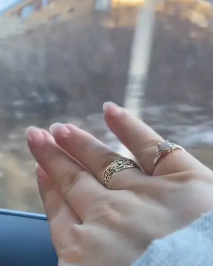 She then touches the window to leave fingerprints.