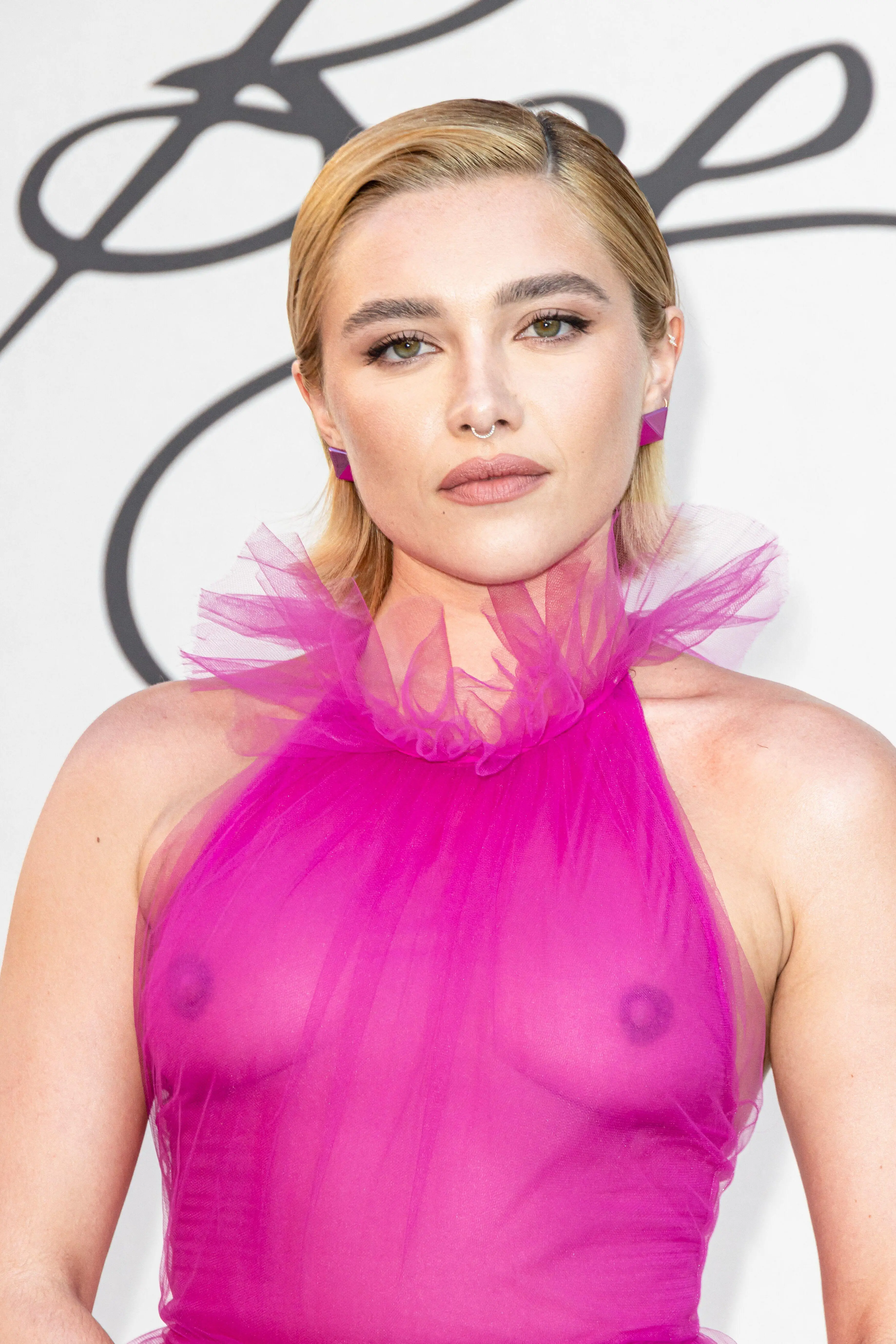 Florence Pugh shared pictures of her sheer tulle dress on Instagram.