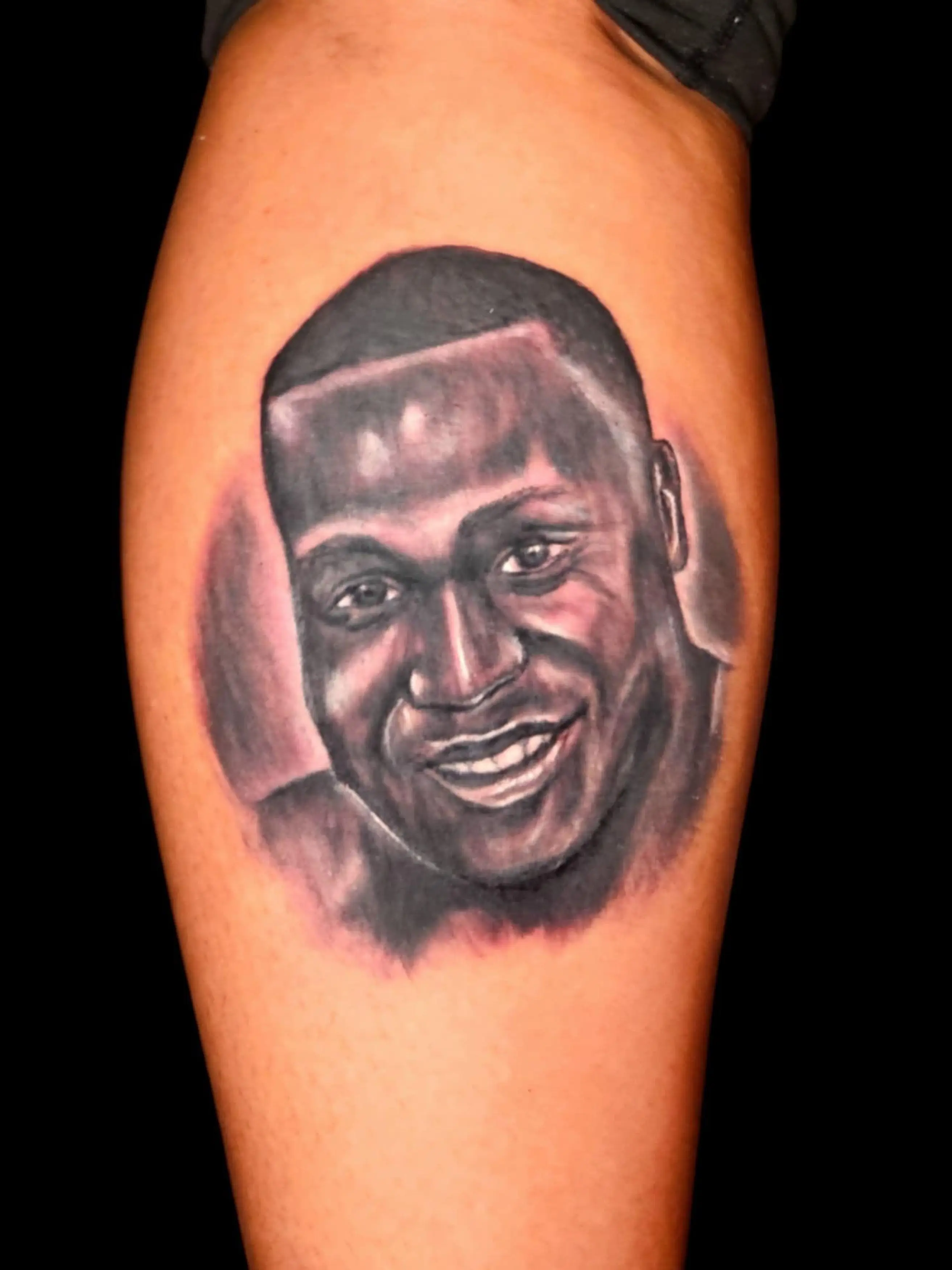 QQuiniece Washburn got a black and white portrait of her deceased brother Terrell Brown (Kennedy News and Media)