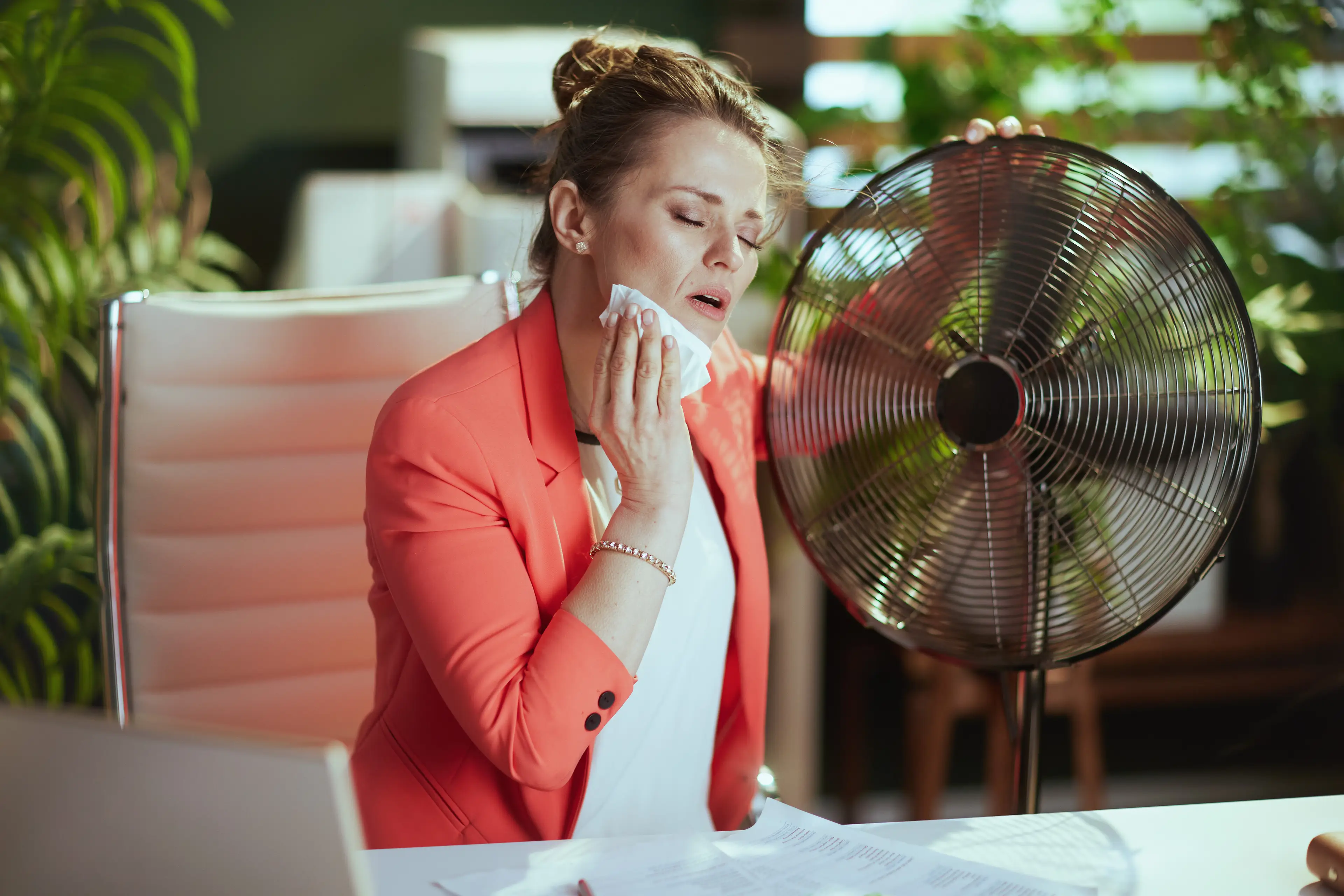When is it actually 'too hot to work' in the office? (Getty Stock Images)