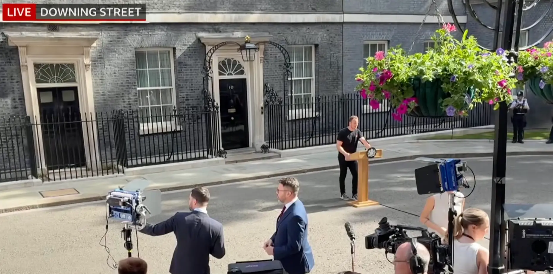 The man has been nicknamed 'hot podium guy' (BBC)