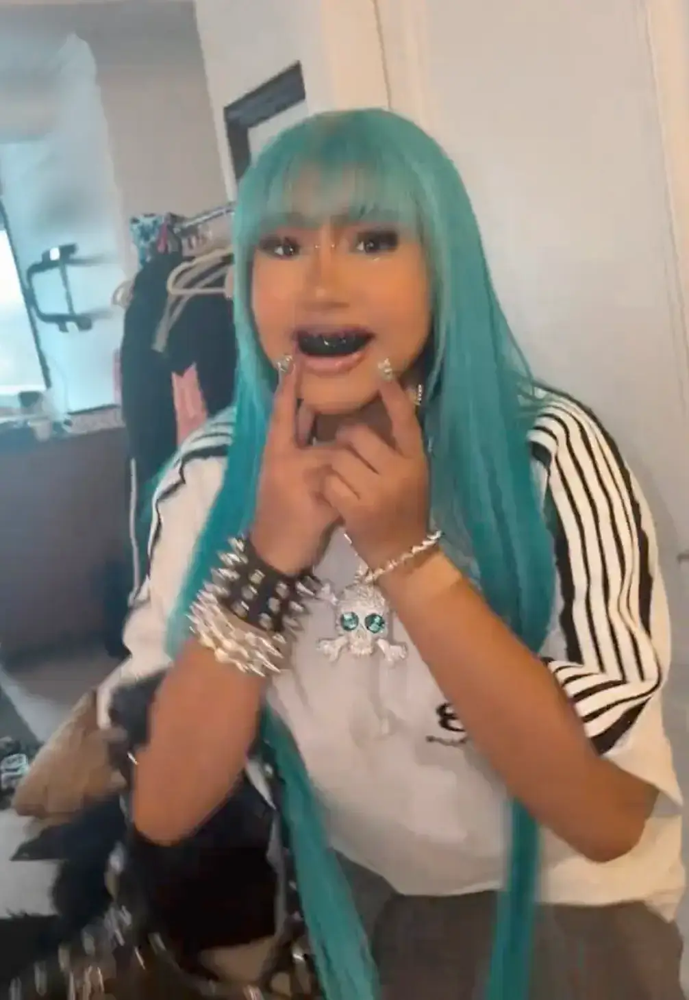 North showed off blackened teeth and a whopping diamond necklace (Tiktok/kimandnorth)