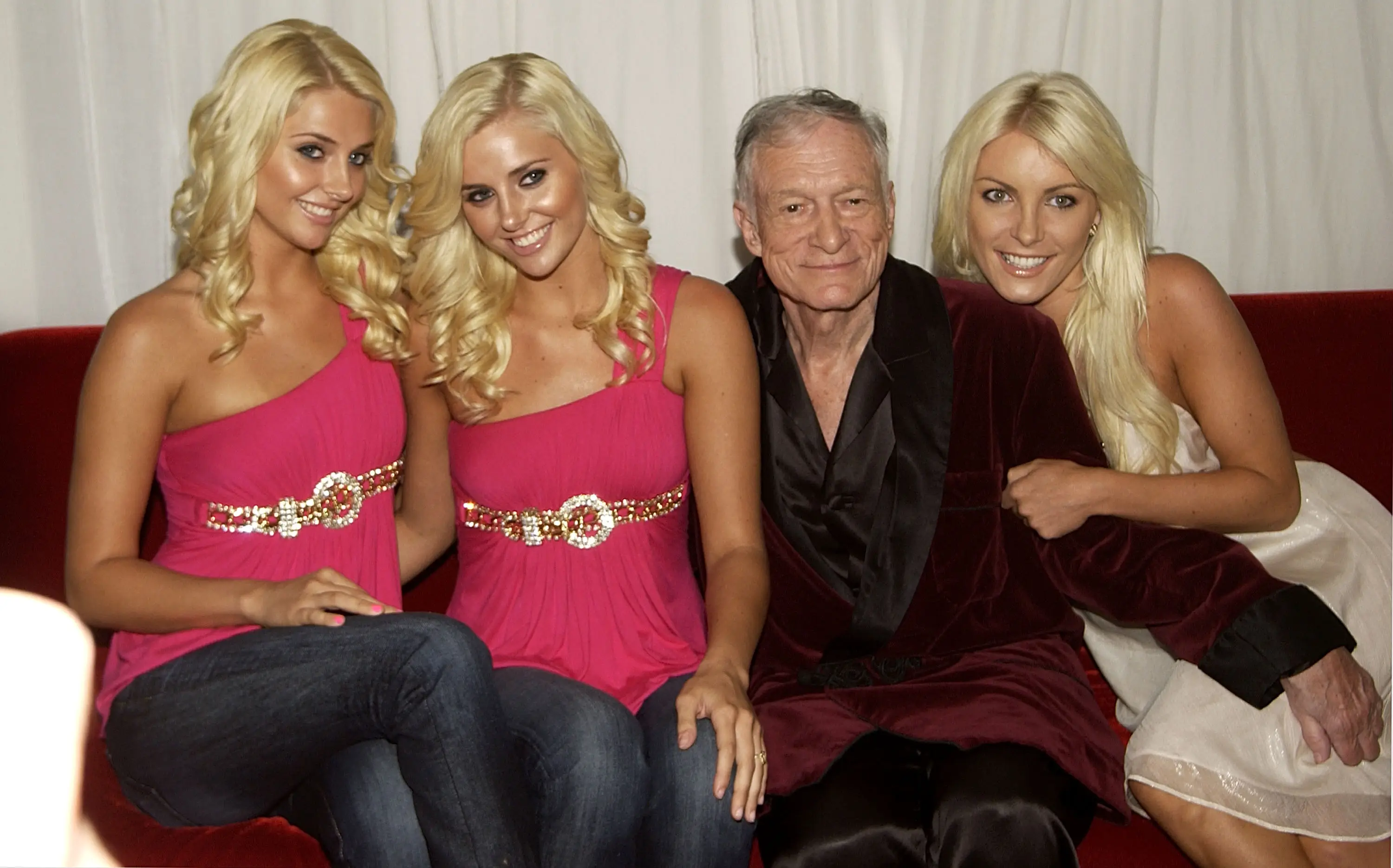 The twins pictured with Hugh Hefner and Crystal Harris in 2009 (Mike Guastella/WireImage)