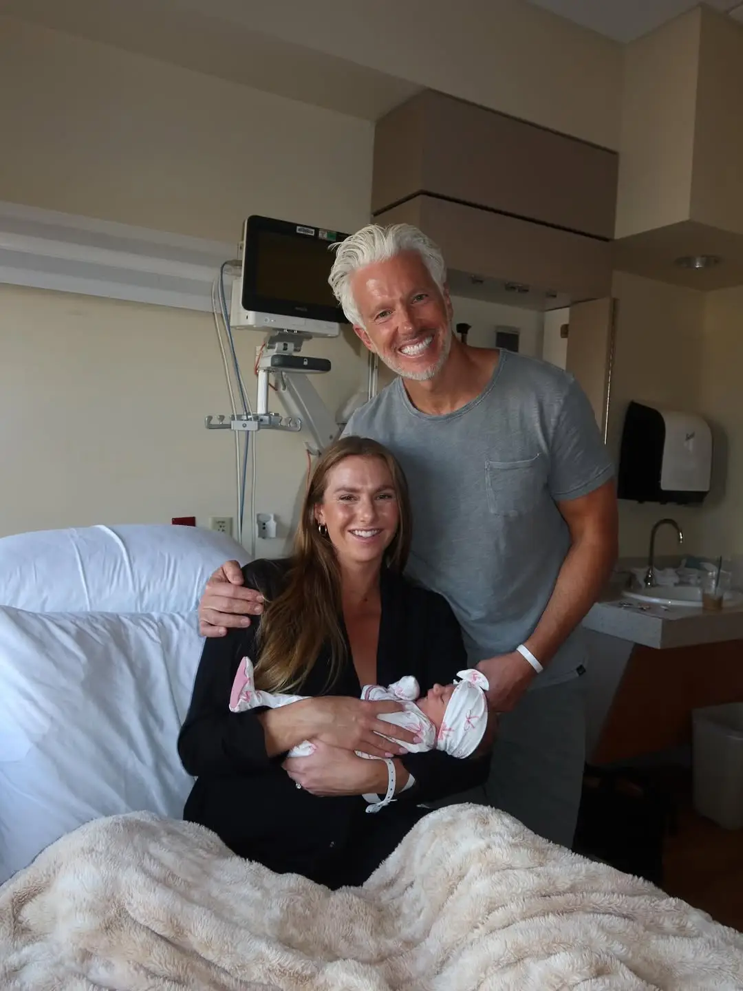 Influencers Emily Stomatuk and Michael Justin have welcomed their first child together (Instagram/@em_stomatuk)