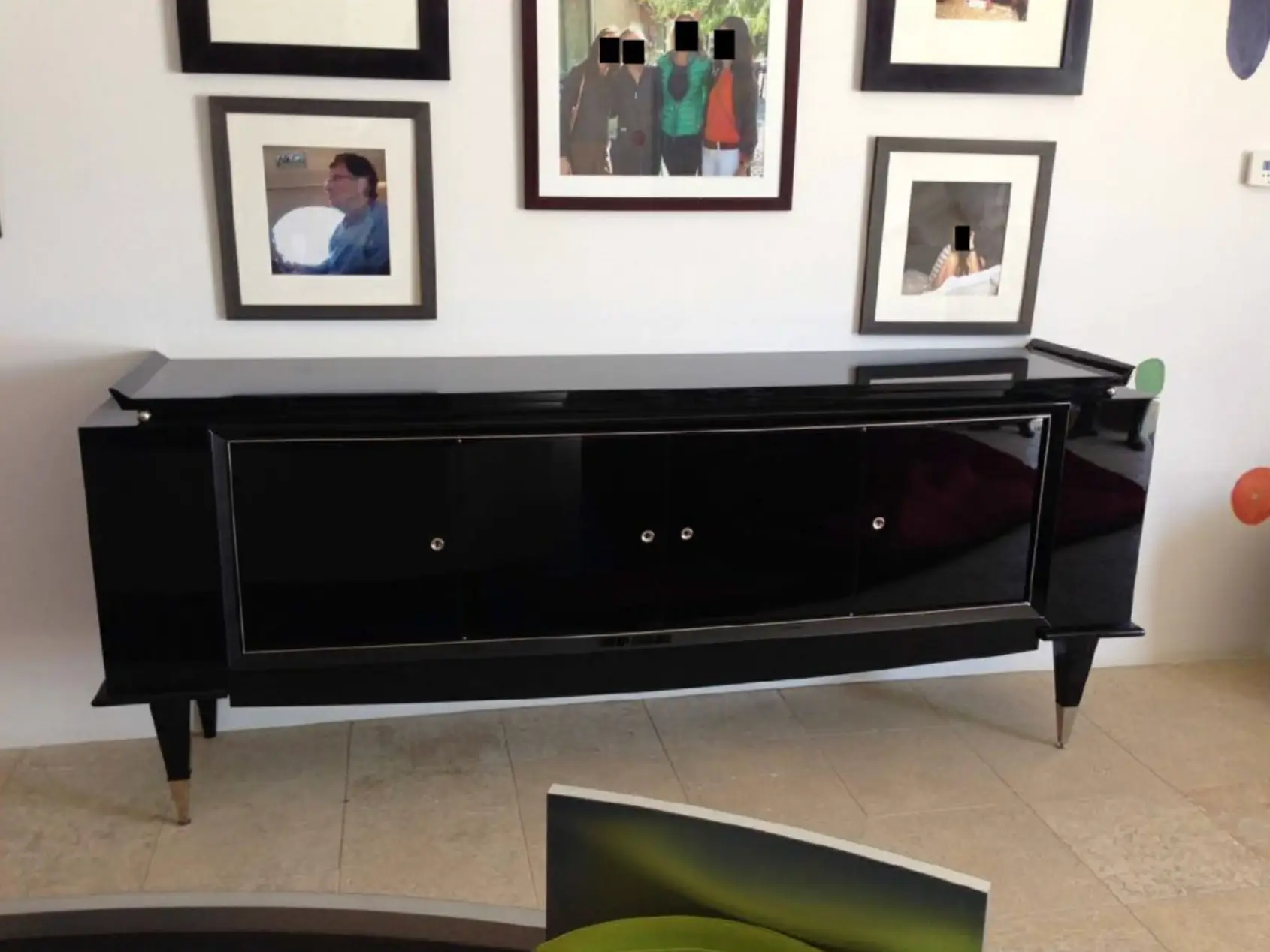 Another shows Bill Gates appears in a framed photo hanging on the wall in a living space (House Oversight Committee)