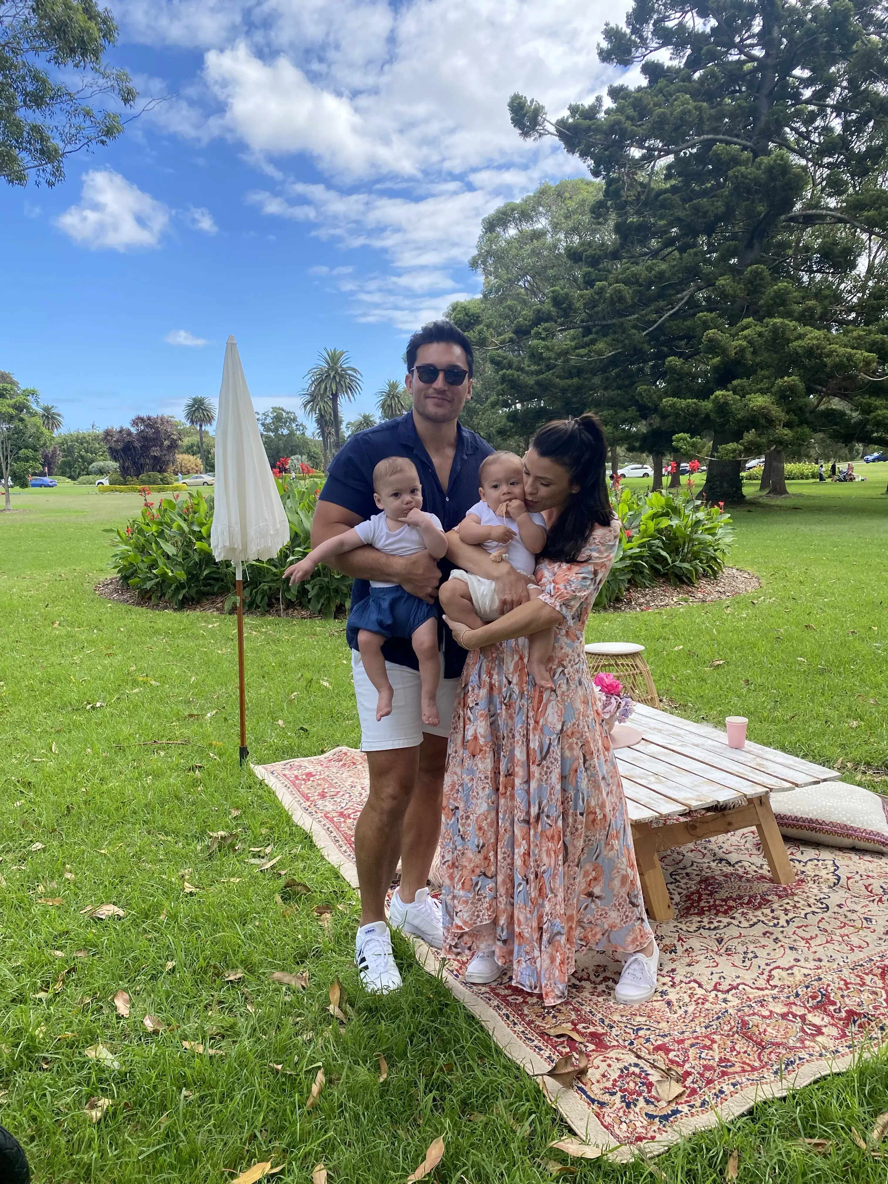 Katie and her husband Harry with their twin sons.