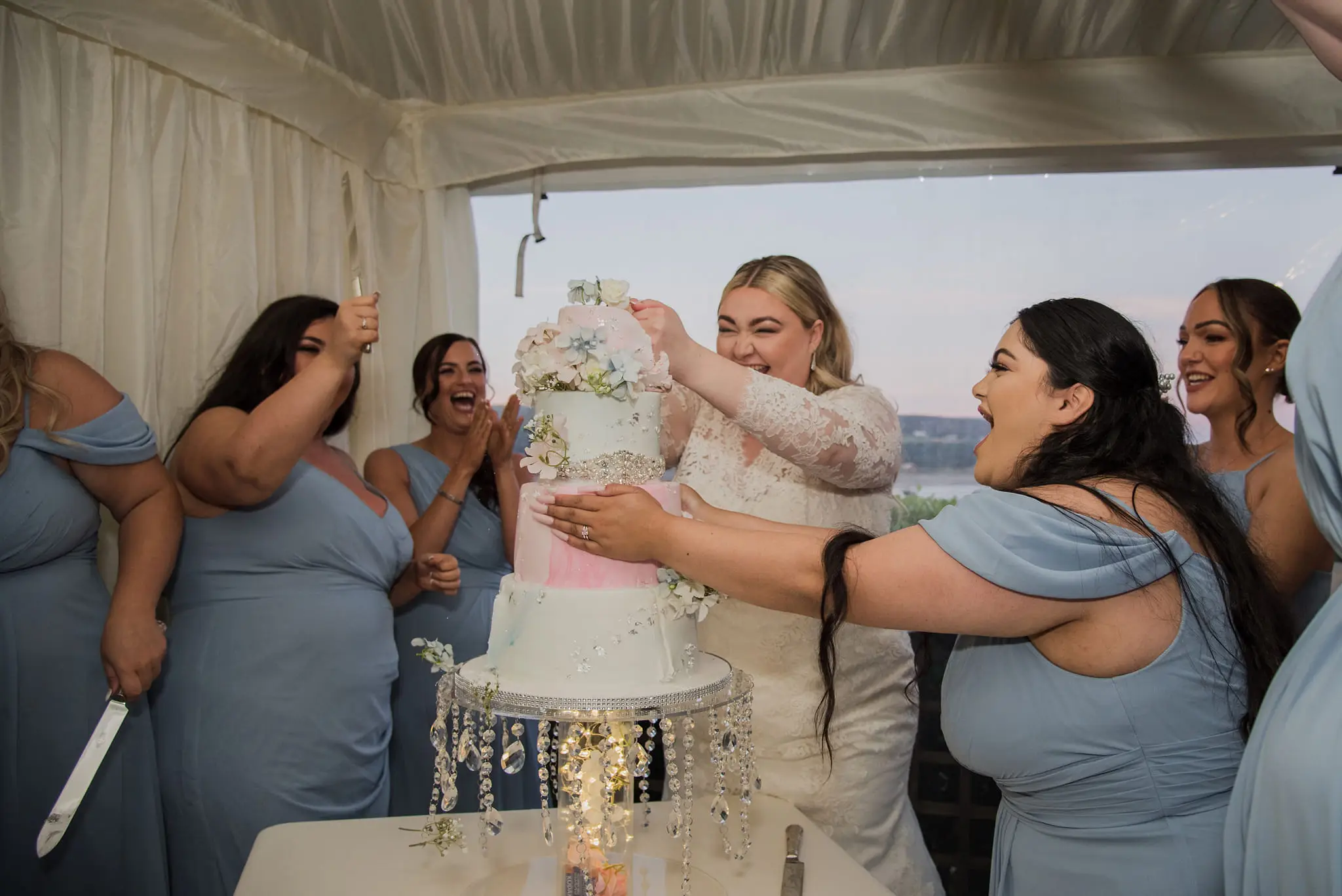 Kayley hilariously punched her groom off her wedding cake.