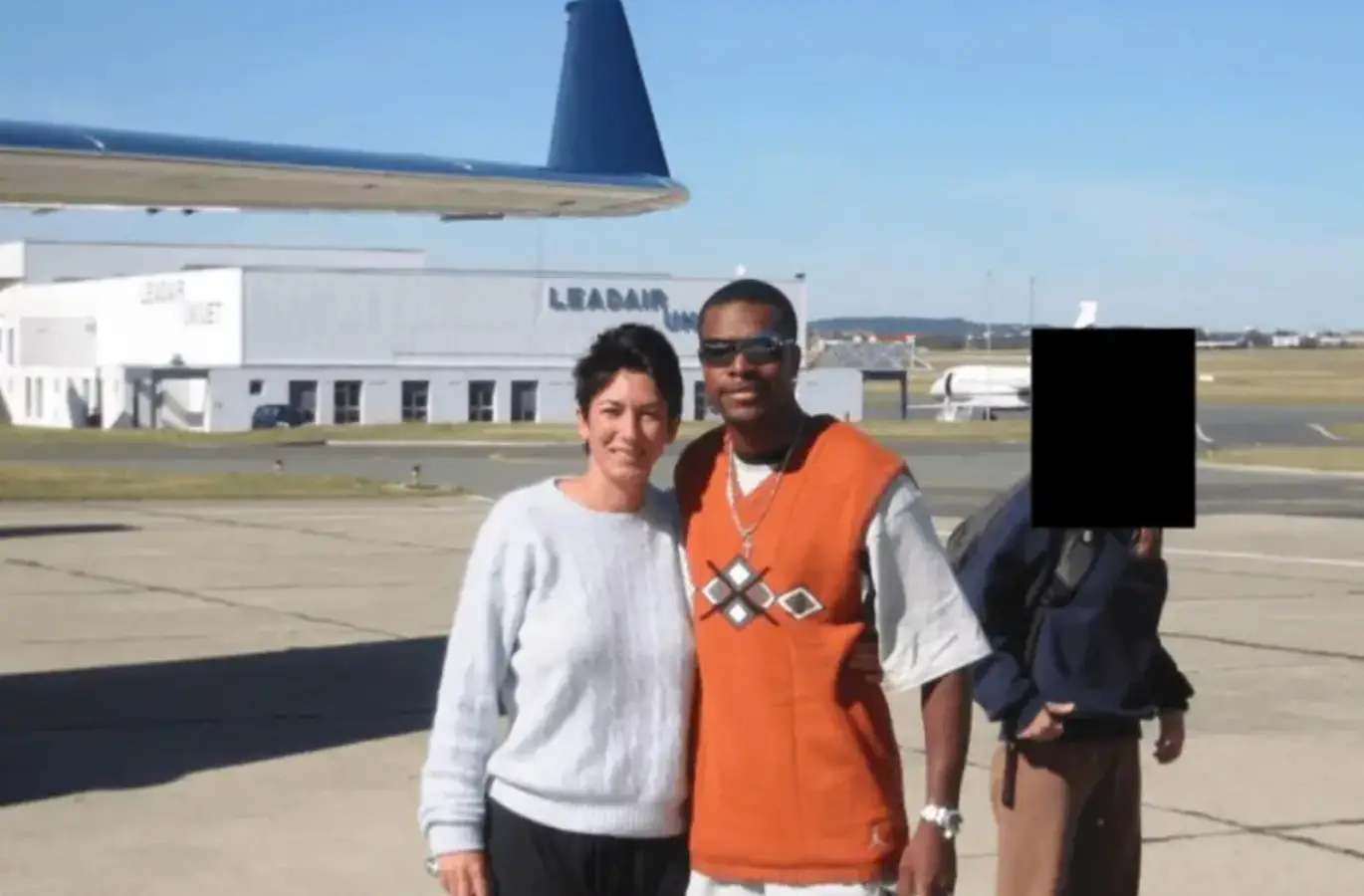 Chris Tucker is seen posing with Ghislaine Maxwell (Department of Justice)