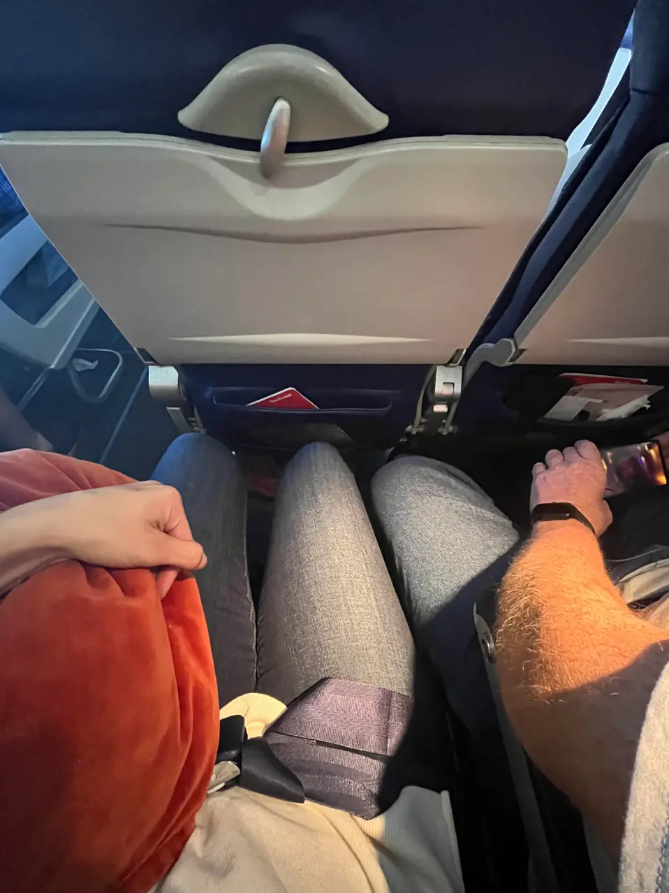 Personal space and planes aren’t particularly compatible, but this photo really takes the biscuit.
