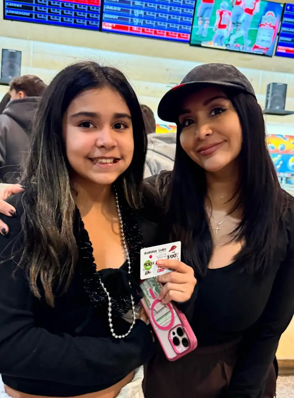 The reality TV star (right) said that the idea of not having any more kids is 'messing' with her 'a little bit' (Instagram/@snooki)