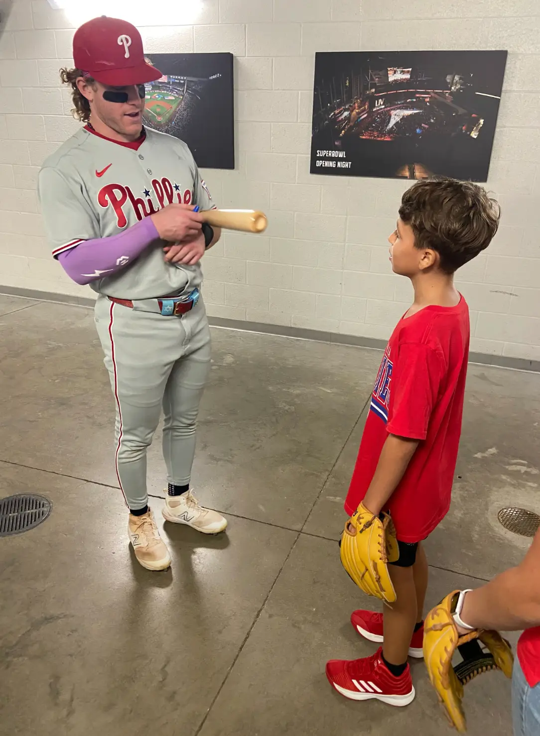 Bader later signed a bat for the young fan (X/@Phillies)