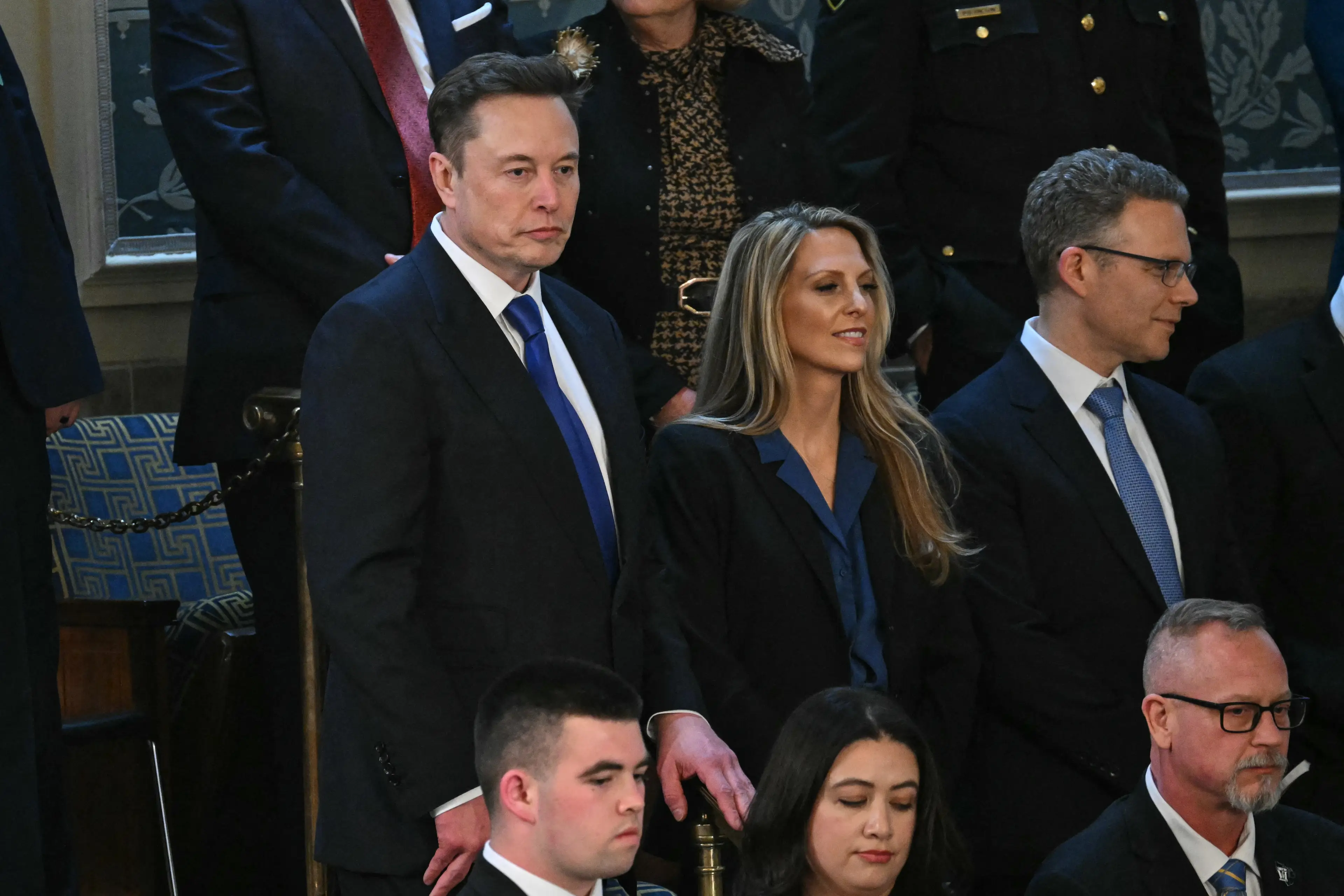 Speculation was rife after a mysterious blonde woman was spotted next to Elon Musk at Trump's recent address to Congress (SAUL LOEB/AFP via Getty Images)
