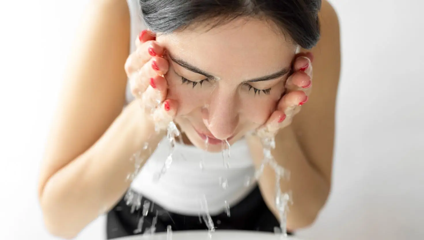 Washing affected areas more than twice a day can have a negative impact on your acne (Getty Stock Image)