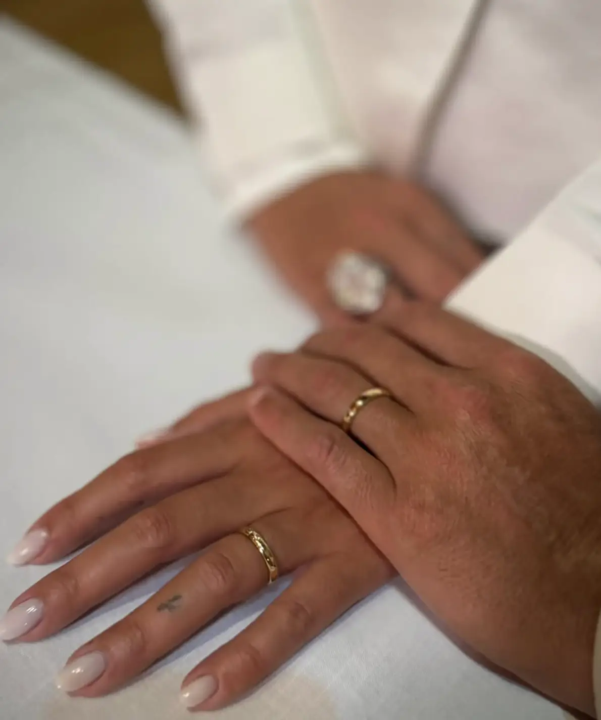 The couple enjoyed an intimate ceremony in their living room (Instagram/@georginagio)