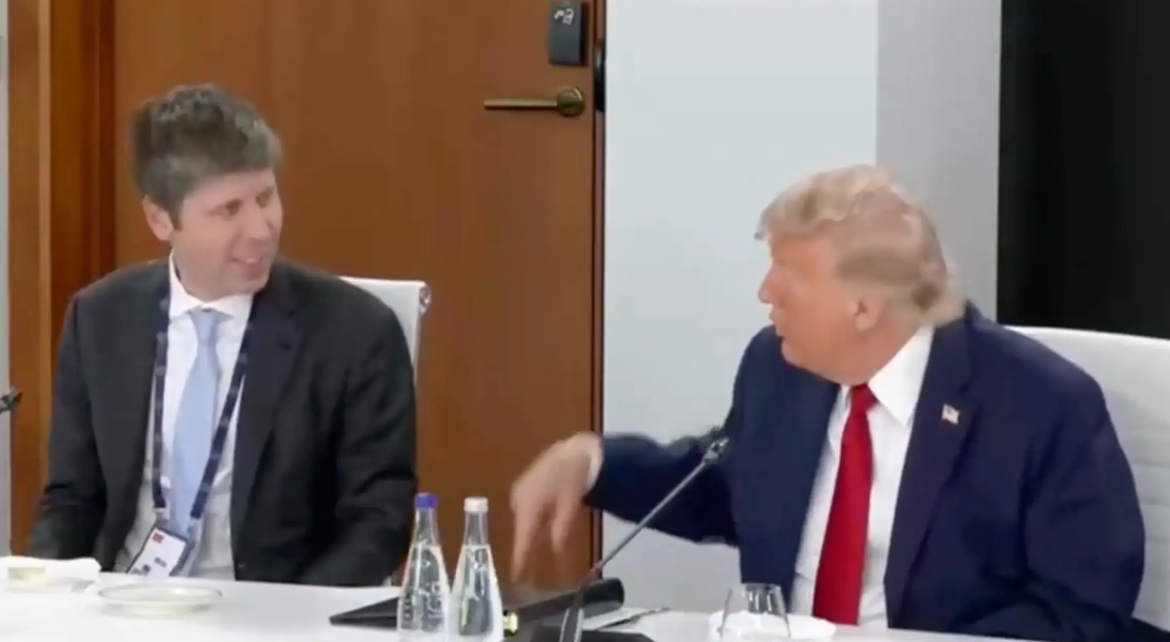 Trump was sat next to American entrepreneur Sam Altman (C-SPAN)