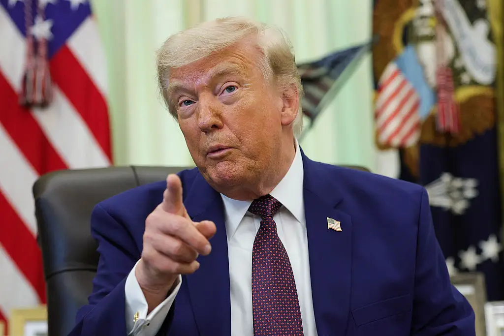 Donald Trump banned residents of 12 countries from entering the US last year (Photo by Kevin Dietsch/Getty Images)